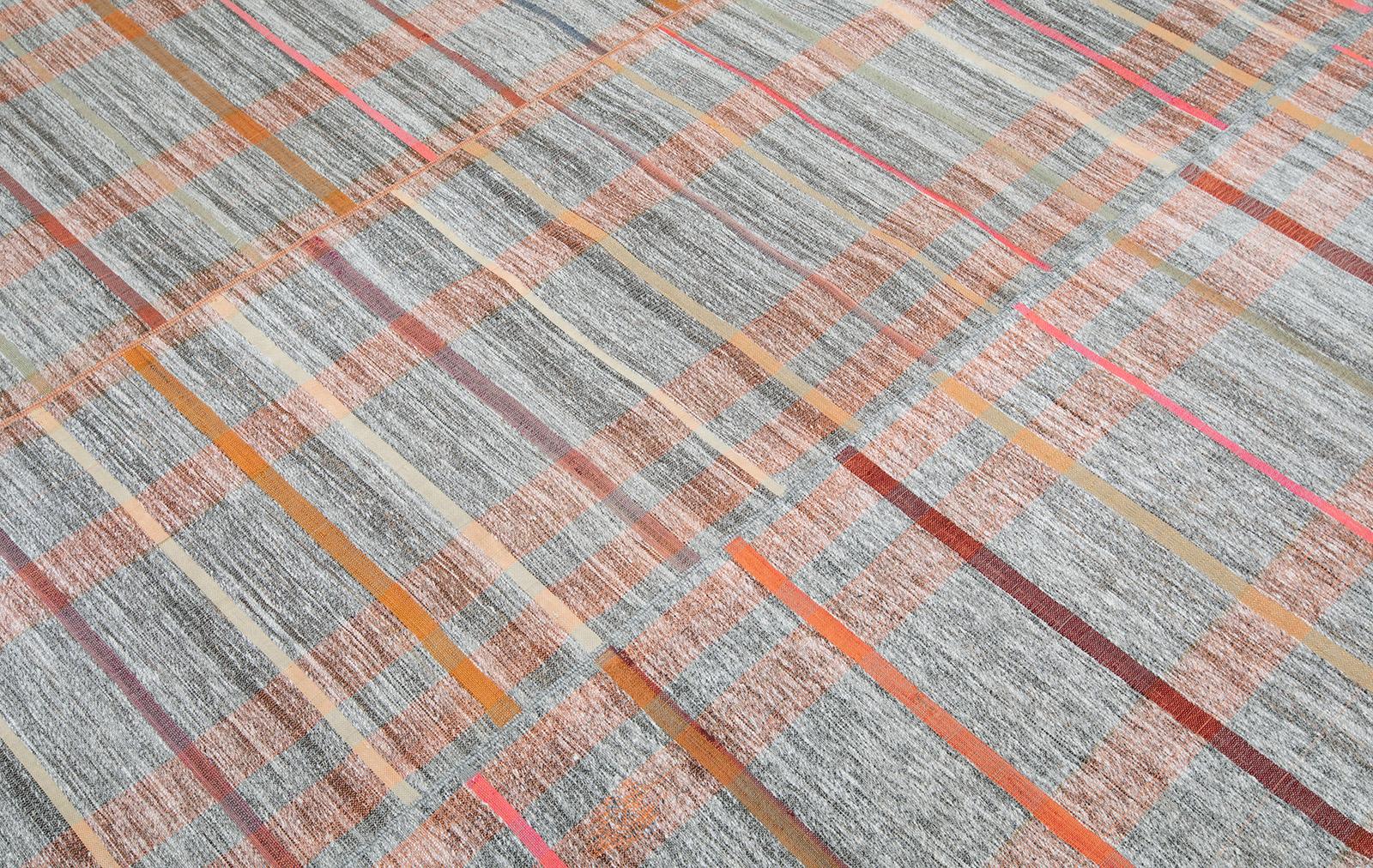 This one-of-a-kind vintage flat-weave rug is made of the finest hand-carded wool and crafted by expert weavers. 
Custom sizes and colors available. 
Rug size 6'1