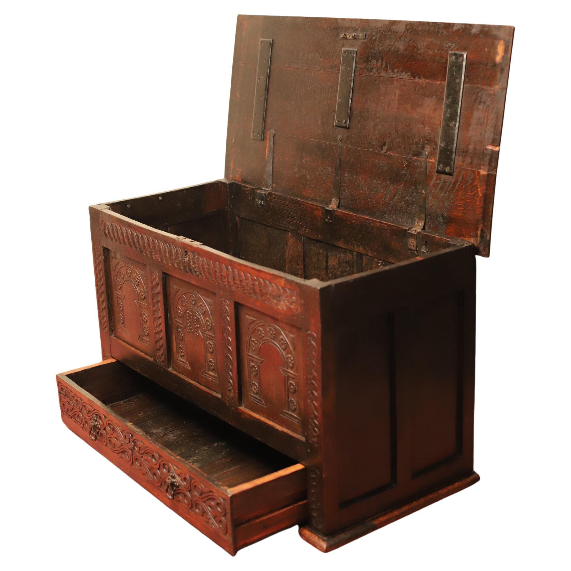 Unique Victorian Carved Oak Mule Chest Made By Hewetson, Milner & Thexton Ltd , with hinged lid and the base is fitted with one drawer , circa 1880 .
Trading between 1839 and 1910 under various names, Hewetson & Milner was a cabinet maker,