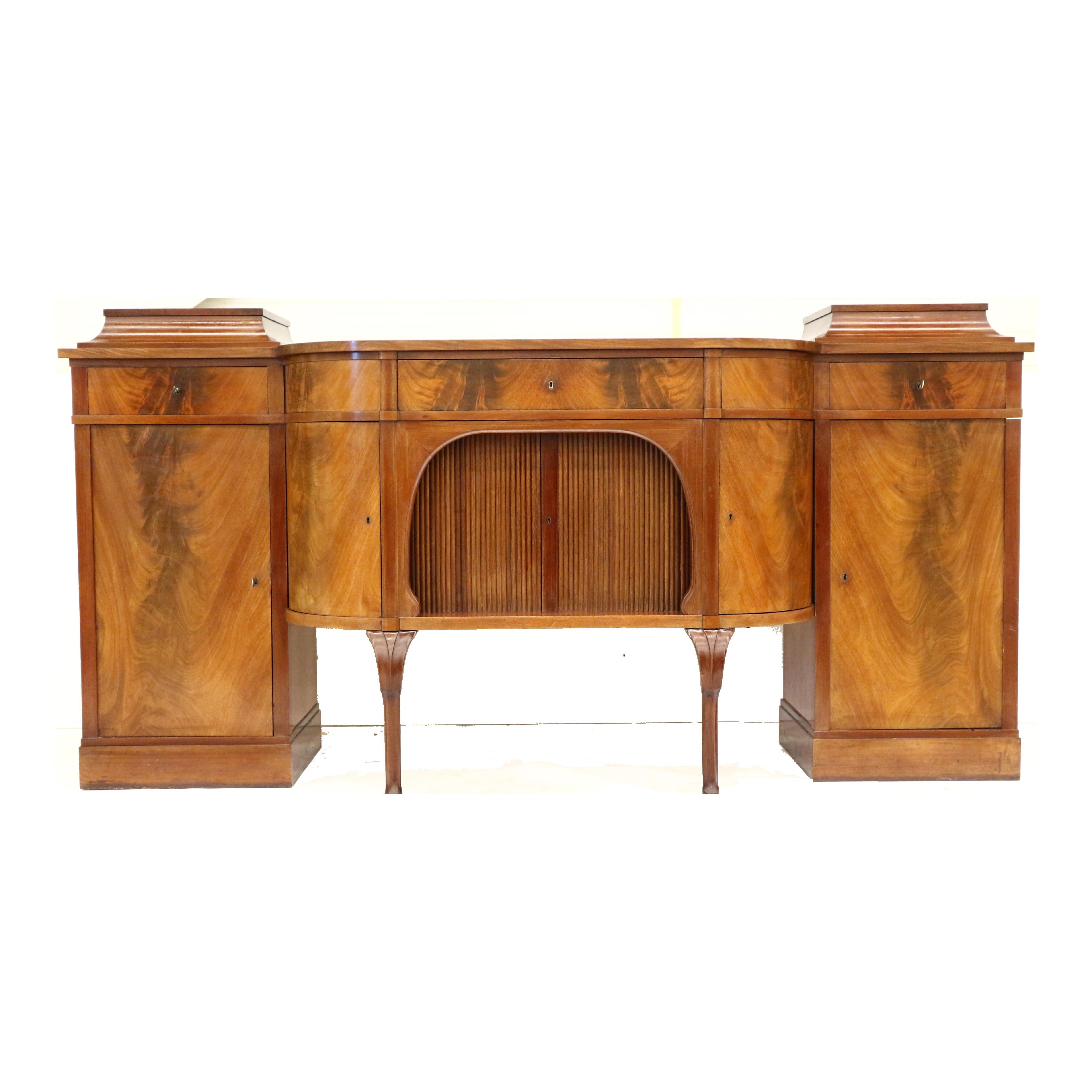 Unique Victorian flamed mahogany sideboard from the 19th century. This beautiful sideboard consists of 3 sections that are beautifully finished.

Dimensions:
Width: 219.1 cm
Height: 110.2 cm
Depth: 62 cm

The sideboard has traces of use appropriate