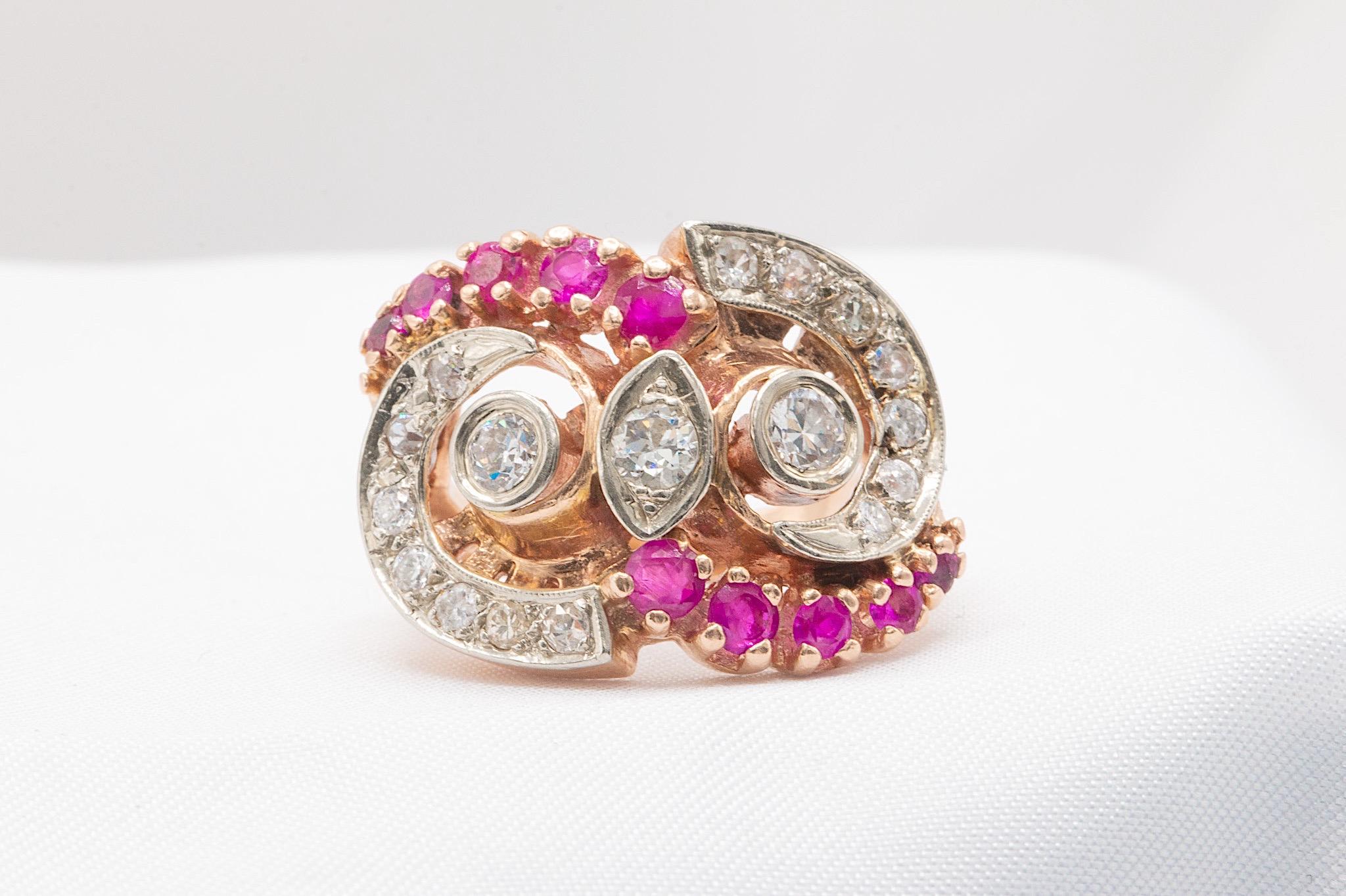 This exceptional vintage owl ring is crafted in 14K rose gold, showcasing a unique and intricate design. Adorned with approximately 1.3 carats of old European cut diamonds (G-H color, VS2-SI1 clarity) and 0.75 carats of vibrant rubies, this piece