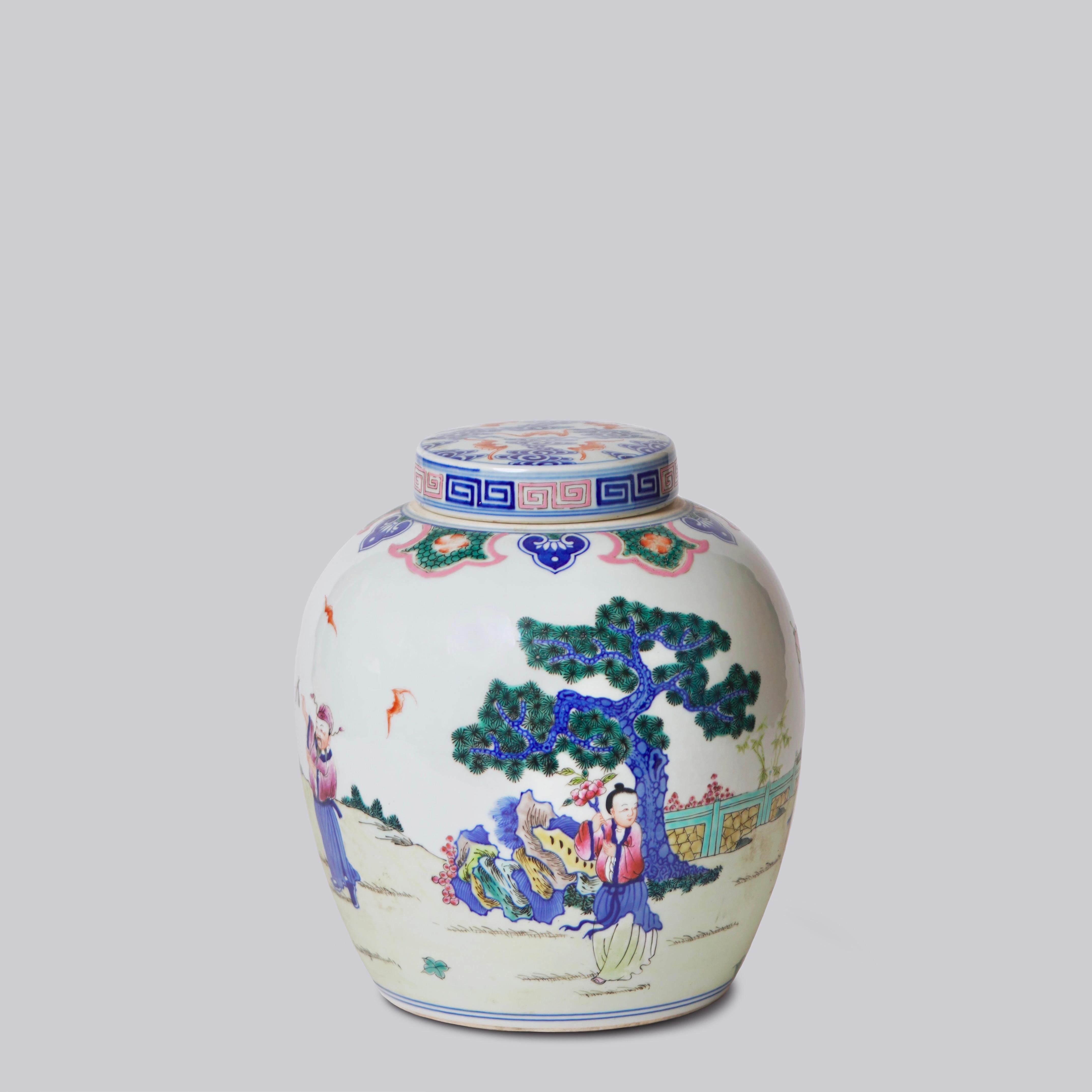 This unique vase is a traditional porcelain vessel from Jingdezhen, a town long distinguished by imperial patronage. This piece is a vintage famille bleu lidded container with a lively hand painted design of the 