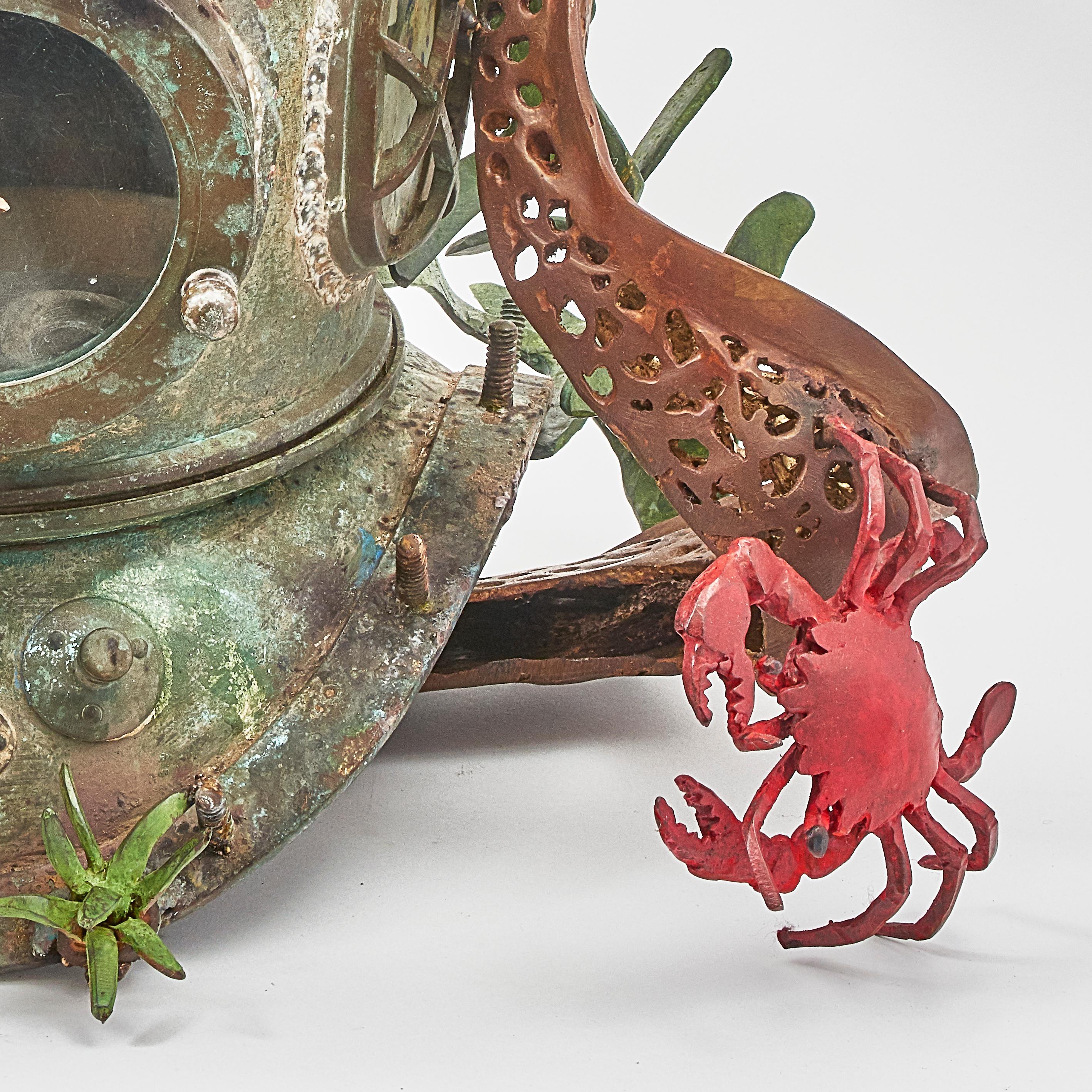 Unique, very impressive large vintage 12 bolt diving helmet, mounted by Belgian Artist Paula Swinnen with an array of aquatic animals and plants, signed by the artist, 2019. The vintage brass helmet with glass vision portholes and a TOA Japan makers
