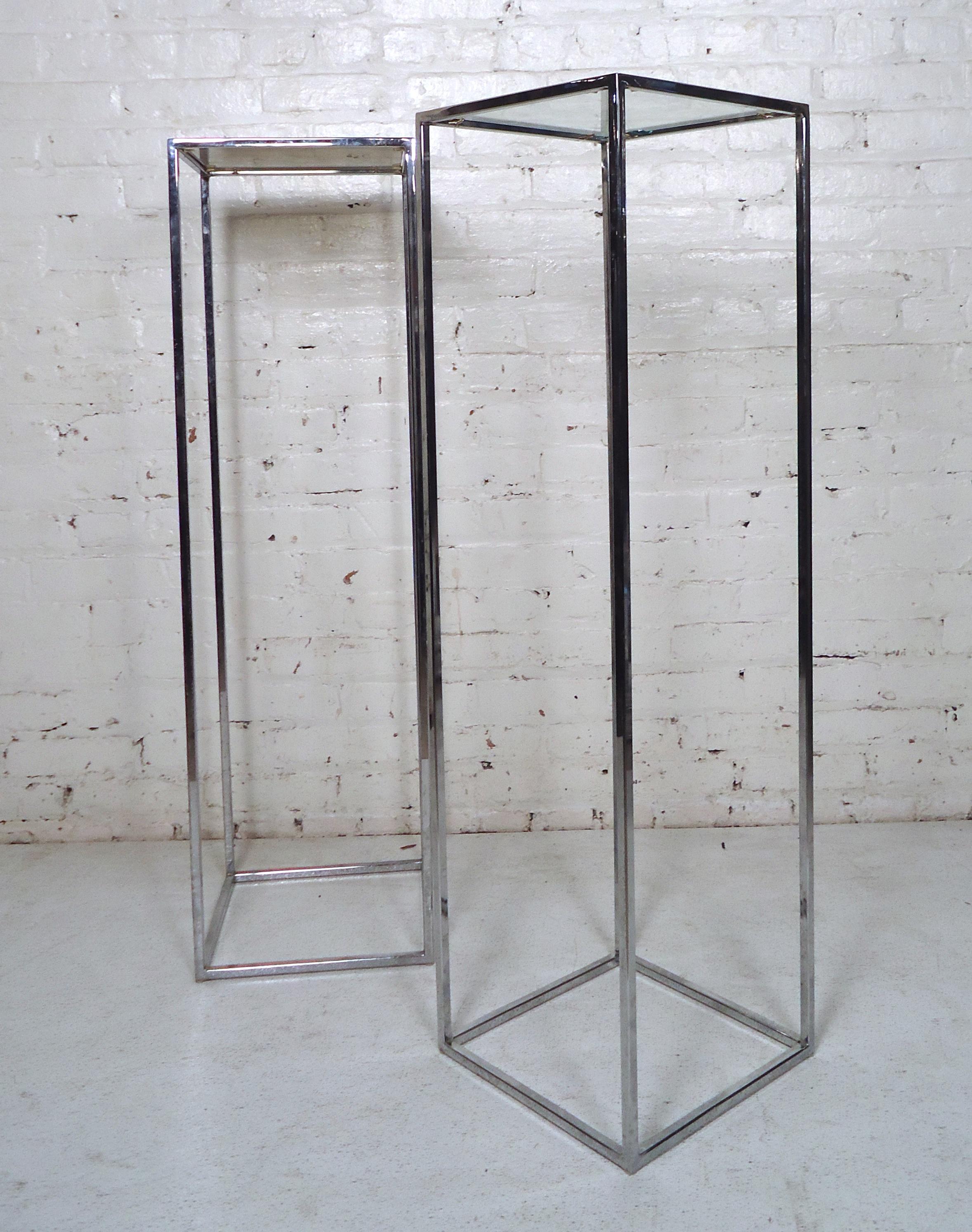 Tall Mid-Century Modern chrome frame pedestals, featuring a glass top and sturdy base.

(Please confirm item location NY or NJ with dealer).