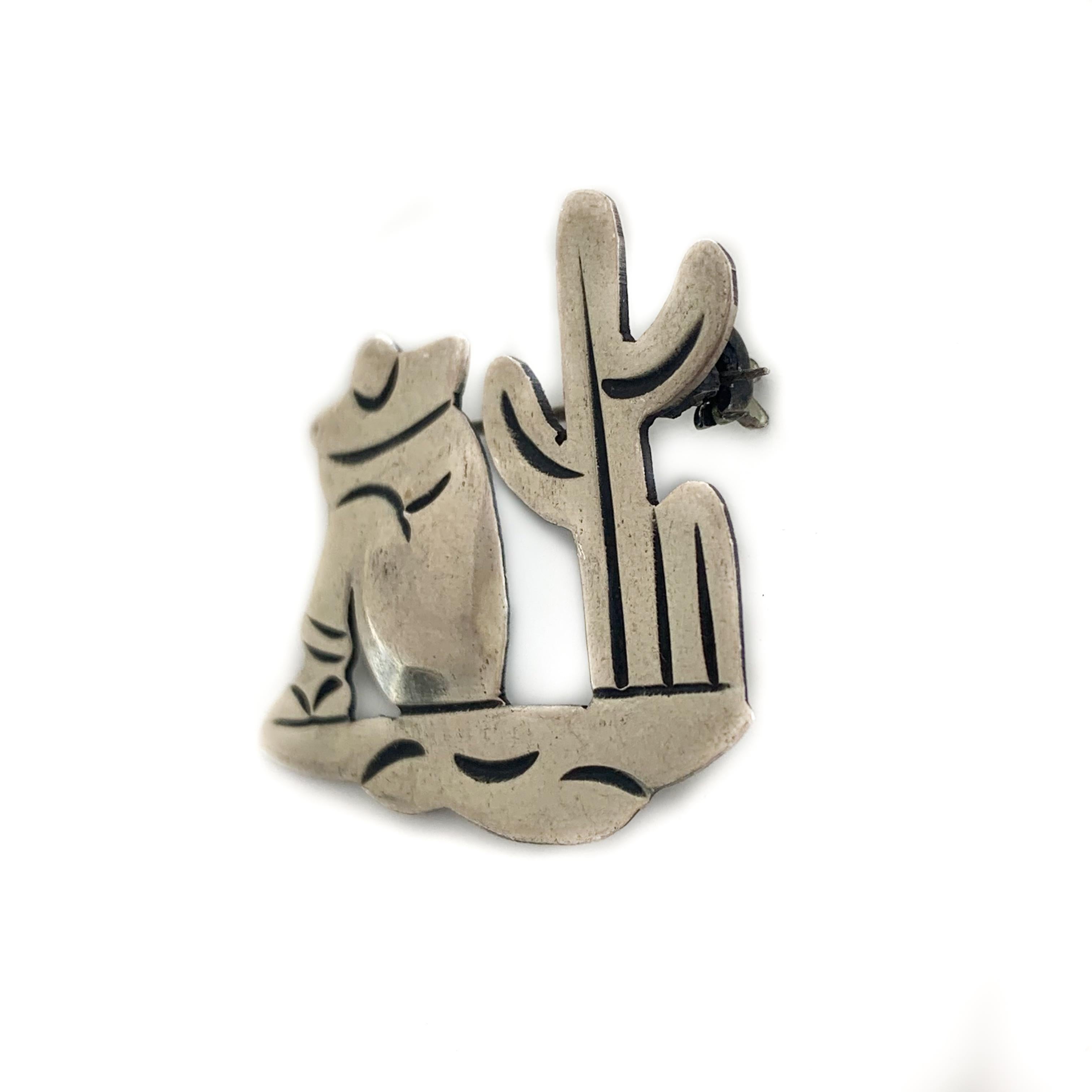 Unique vintage, carved silver, sitting man by cactus, Navajo style brooch