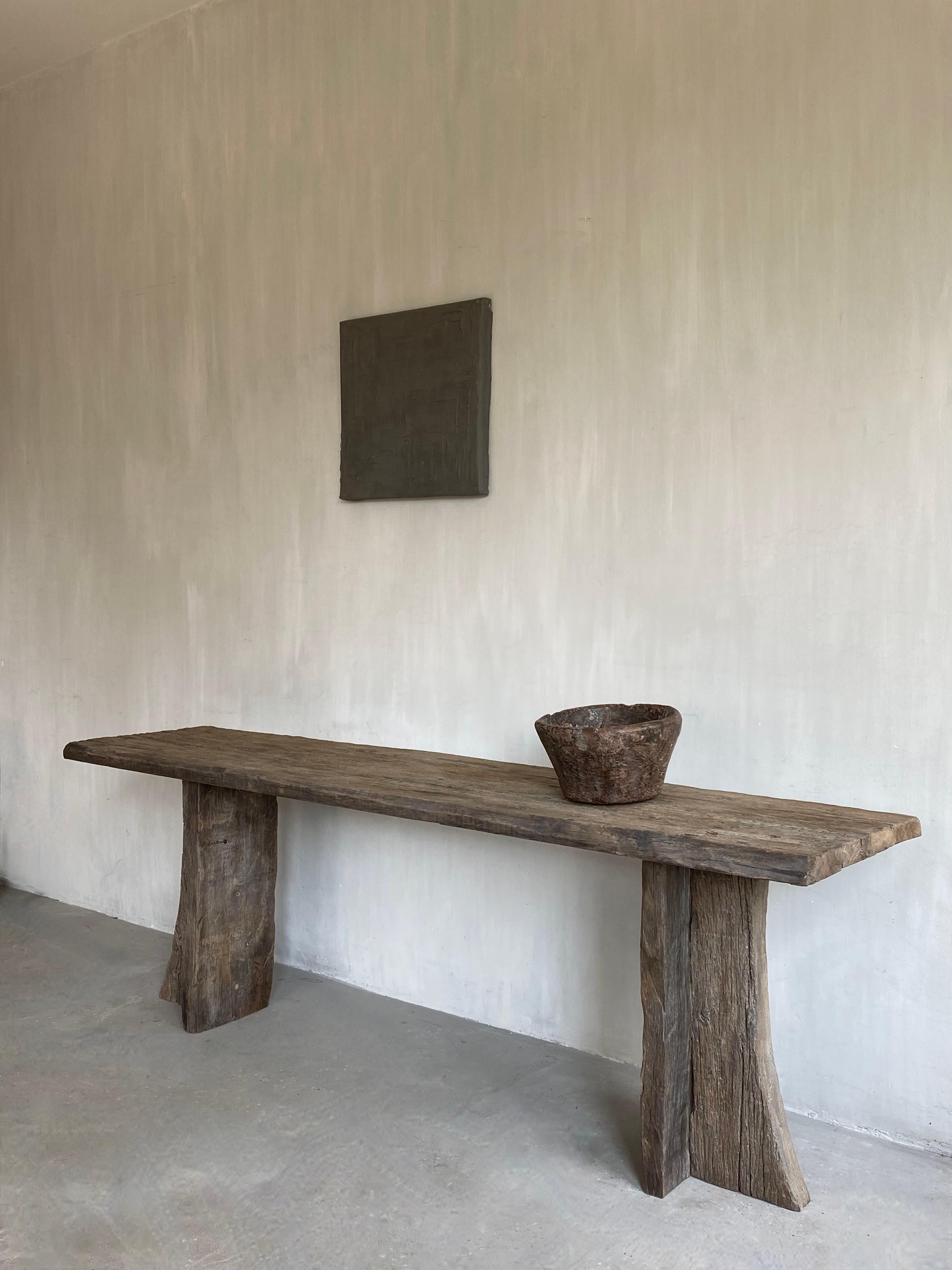 This unique and exclusive Wabi Sabi item is hand cut made in 19th century oak.

The pure lines and authenticity of the wood give the piece a stylish simplicity.

The original wood color with a natural graying fits.

This console looks great