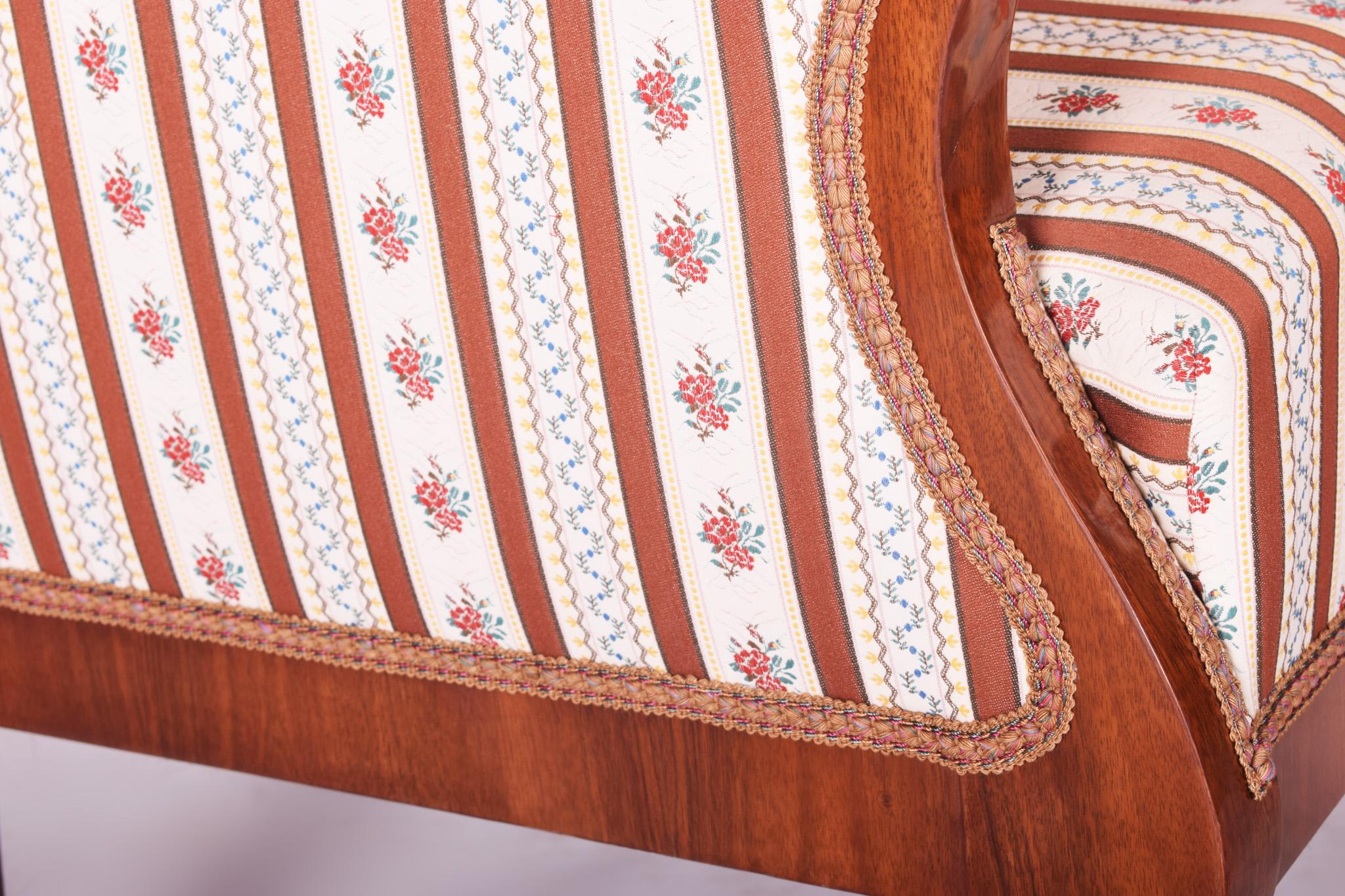 Biedermeier armchair. Material walnut.
Completely restored, surface made by shellac polish
New upholstery and fabric
Source: Bohemia
Period: 1820-1830.
 