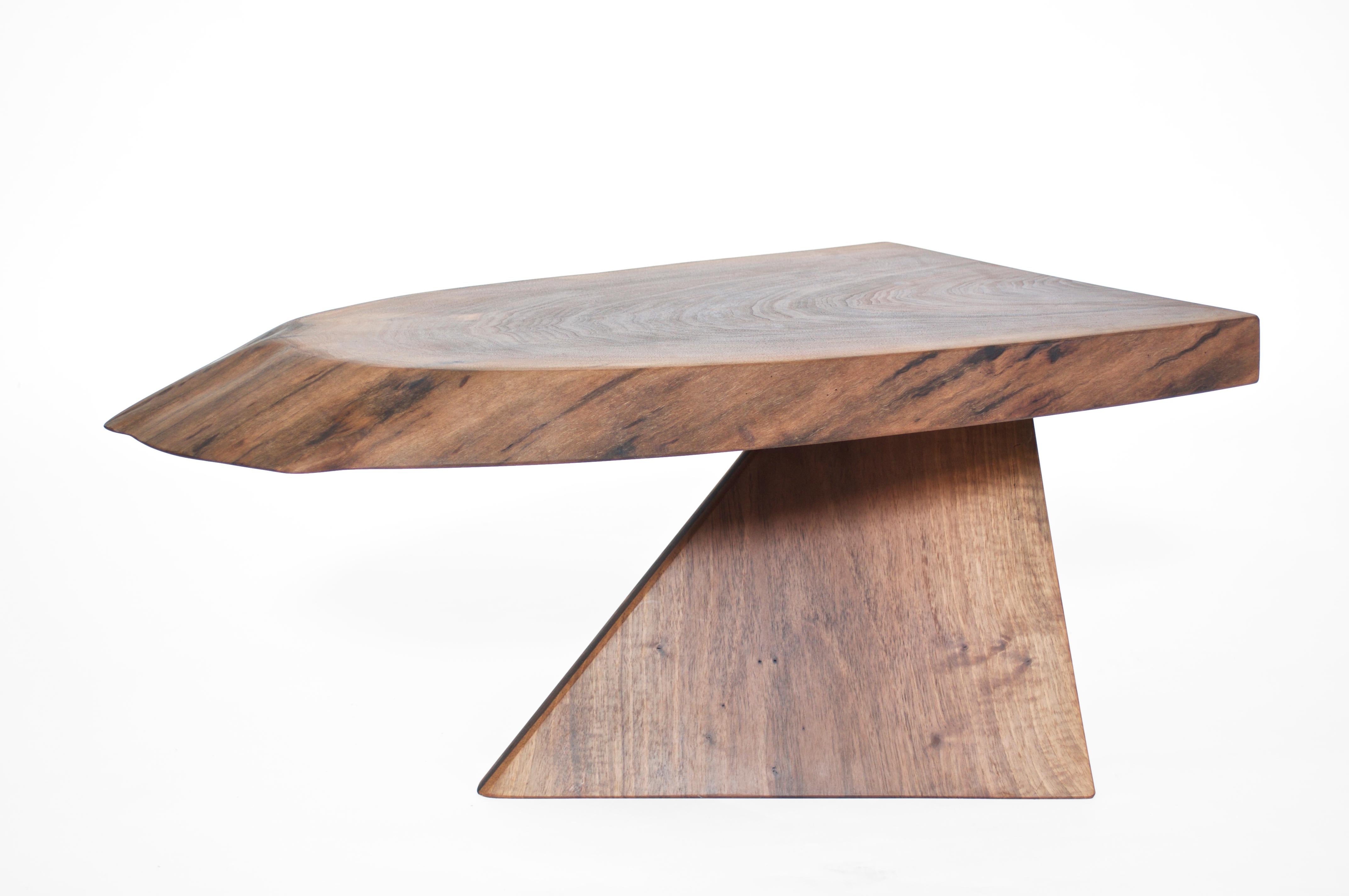 Unique walnut signed table by Jörg Pietschmann T2601
Materials: Walnut, polished oil finish
Measures: H 35 x W 78 x D 47 cm

In Pietschmann’s sculptures, trees that for centuries were part of a landscape and founded in primordial forces tell stories