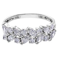 Unica fede nuziale con diamante marquise e diamante rotondo in oro bianco