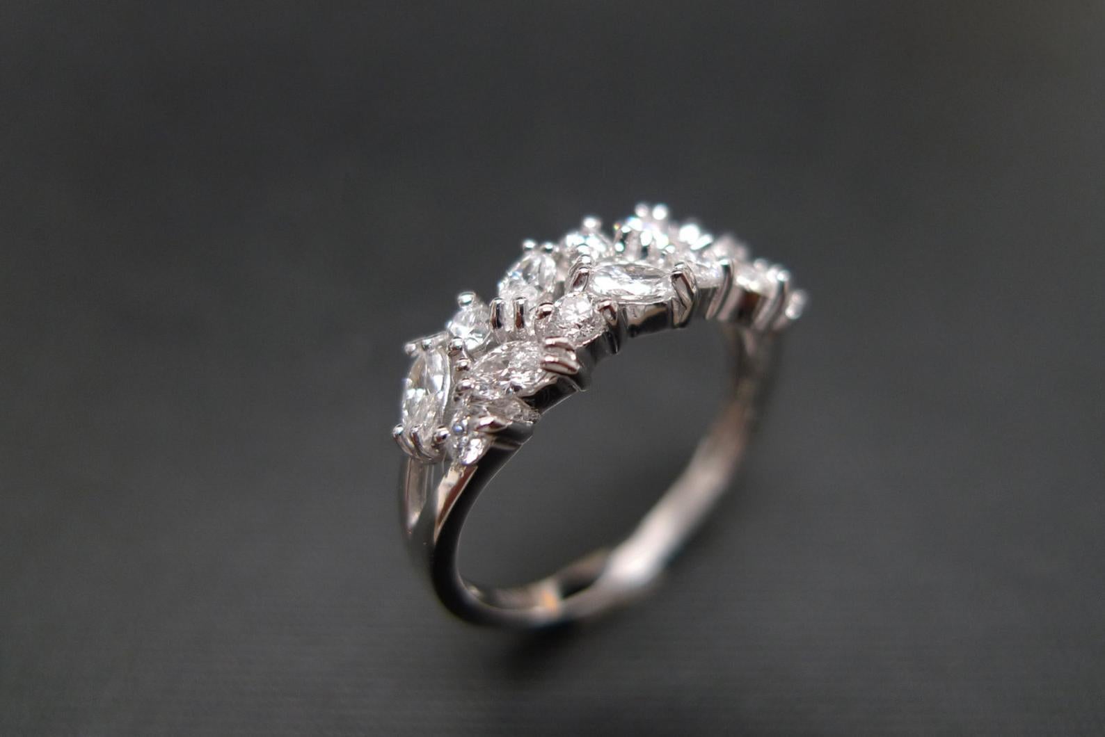 For Sale:  Unique Wedding Ring with Marquise Cut Diamond and Round Diamond 18k White Gold  7