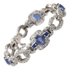 Bracciale unico in oro bianco con zaffiri e diamanti in stile Art Deco.