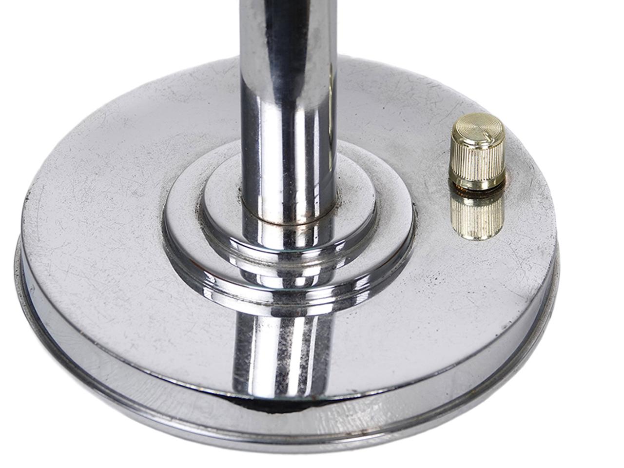 This is a small and unique Art Deco desk lamp and may even work well as a flush mount. This European lamp is signed Jlrin. The glass consists of 2 shallow domes of milk glass and sky blue to create a saucer look. Because of the blue glass its