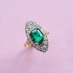 Unique Yellow Gold 2.49 Carat Emerald Ring with White Diamonds