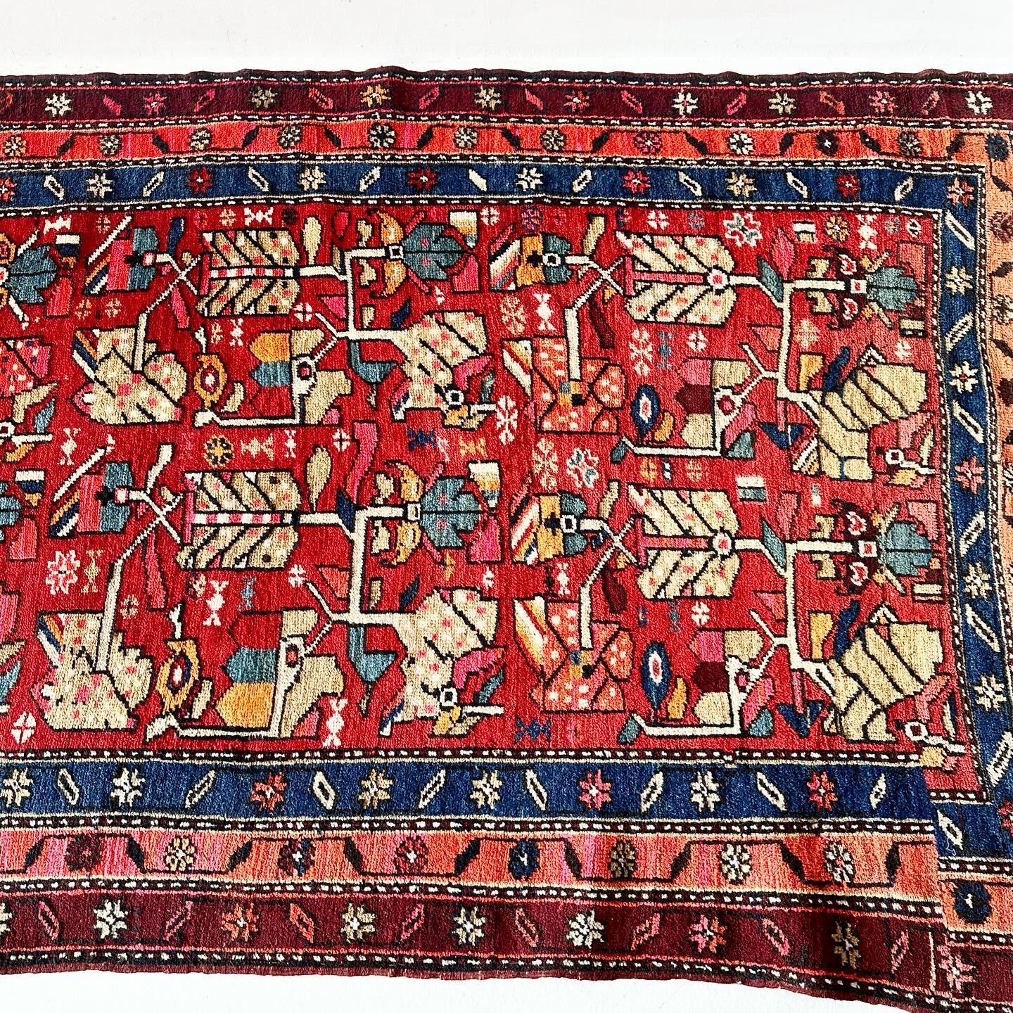 Asian Uniquely shaped vintage hand knotted Turkish rug with low pile For Sale