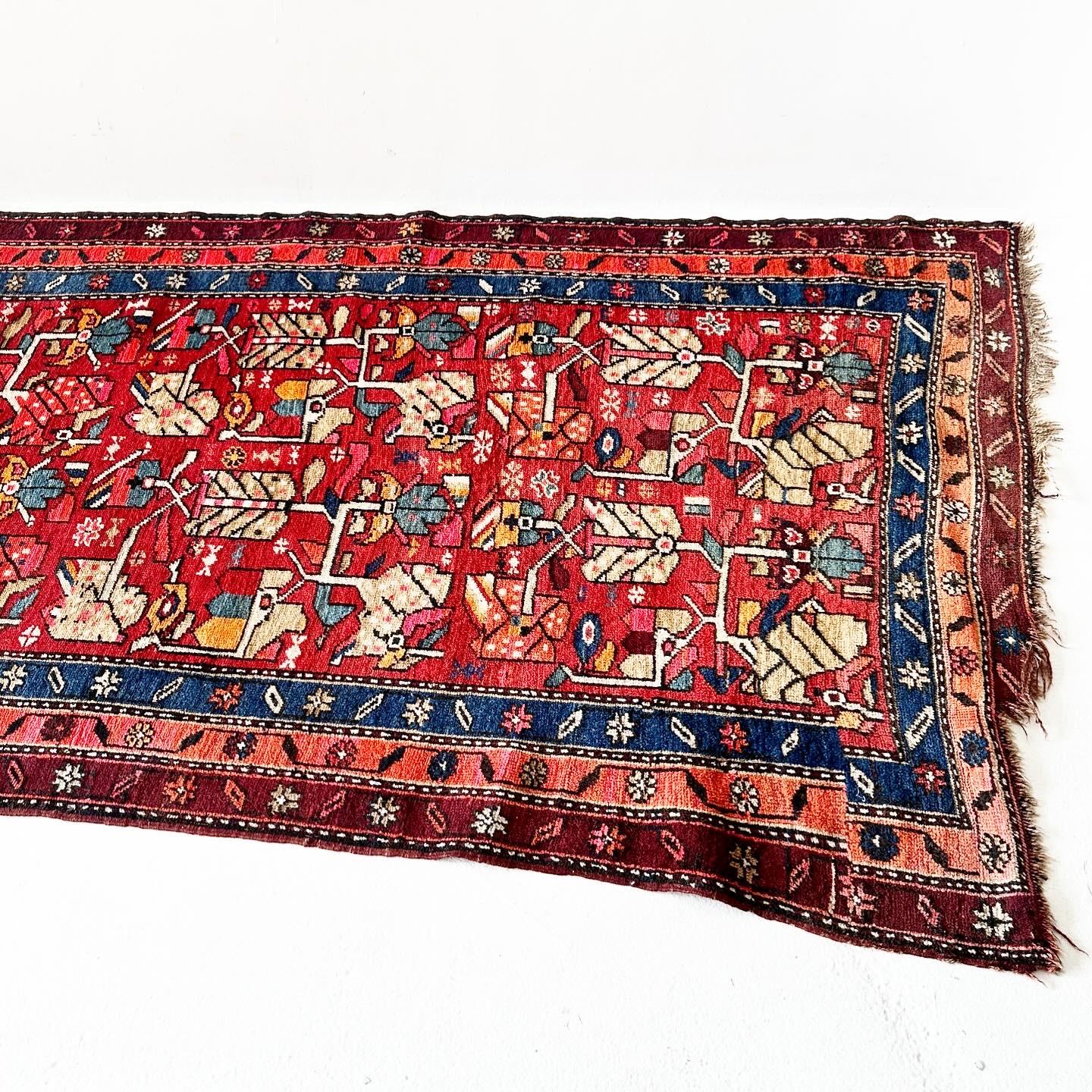 Uniquely shaped vintage hand knotted Turkish rug with low pile In Fair Condition For Sale In Los Angeles, CA