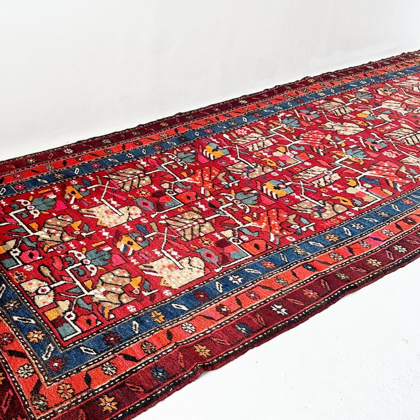20th Century Uniquely shaped vintage hand knotted Turkish rug with low pile For Sale