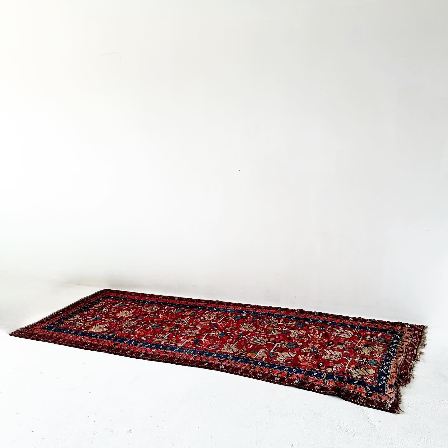 Wool Uniquely shaped vintage hand knotted Turkish rug with low pile For Sale