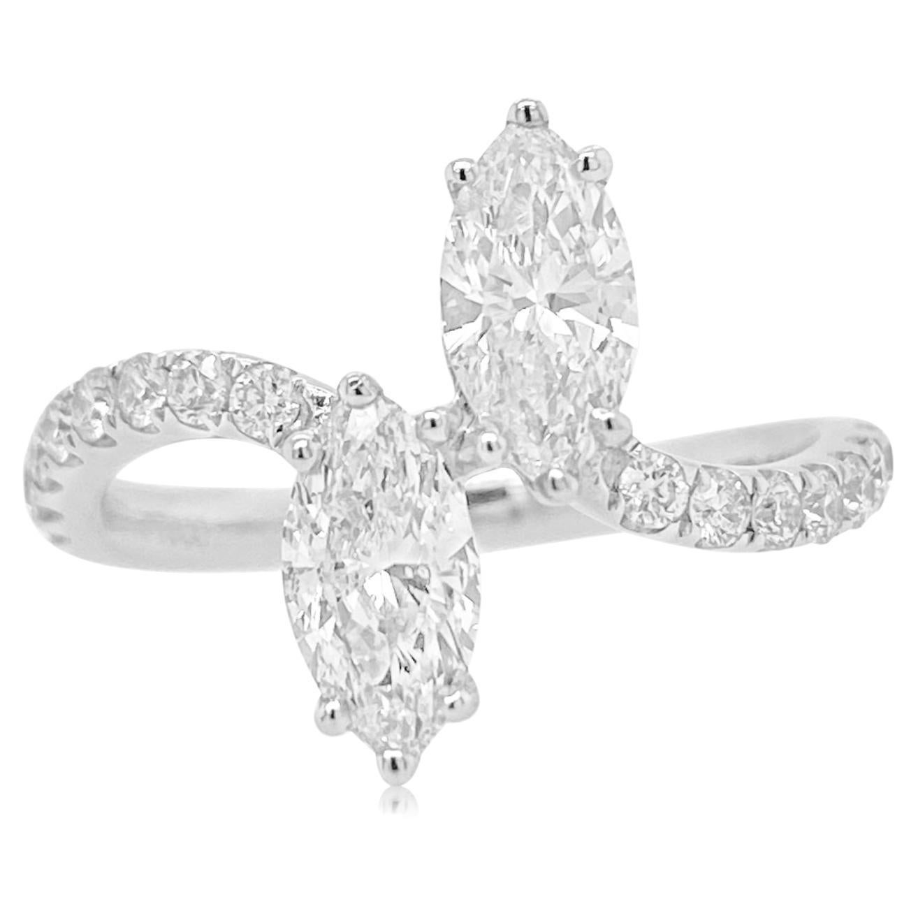 Uniquely styled Ring with certified marquise shaped Natural white diamonds For Sale