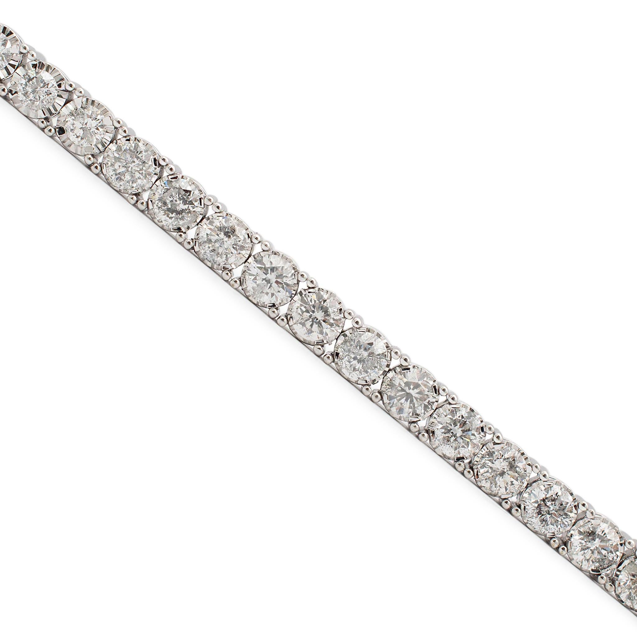 Gender: Unisex

Metal Type: 10K White Gold

Length: 7.50 Inches

Width: 4.00mm 

Weight: 11.92 grams

10K white gold diamond tennis bracelet. Engraved with 