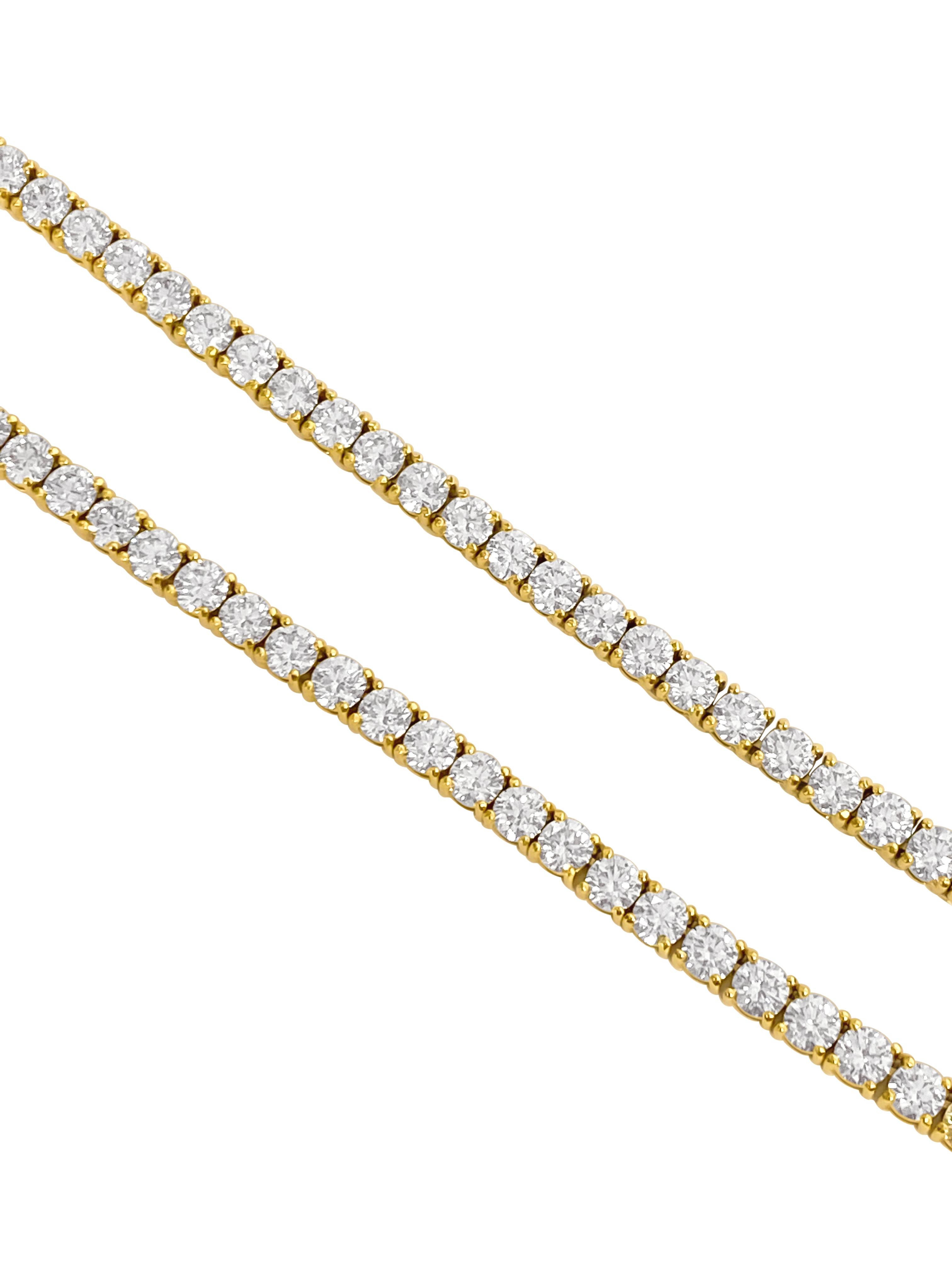 Metal: 14k Yellow Gold

Diamonds: 14.50 Carat Weight Total
148 stones total. 
VVS clarity 
Round brilliant cut diamonds.

20 inch tennis necklace. 

Gorgeous classic diamond tennis necklace. Excellent luster and shine. 

Unisex diamond jewelry