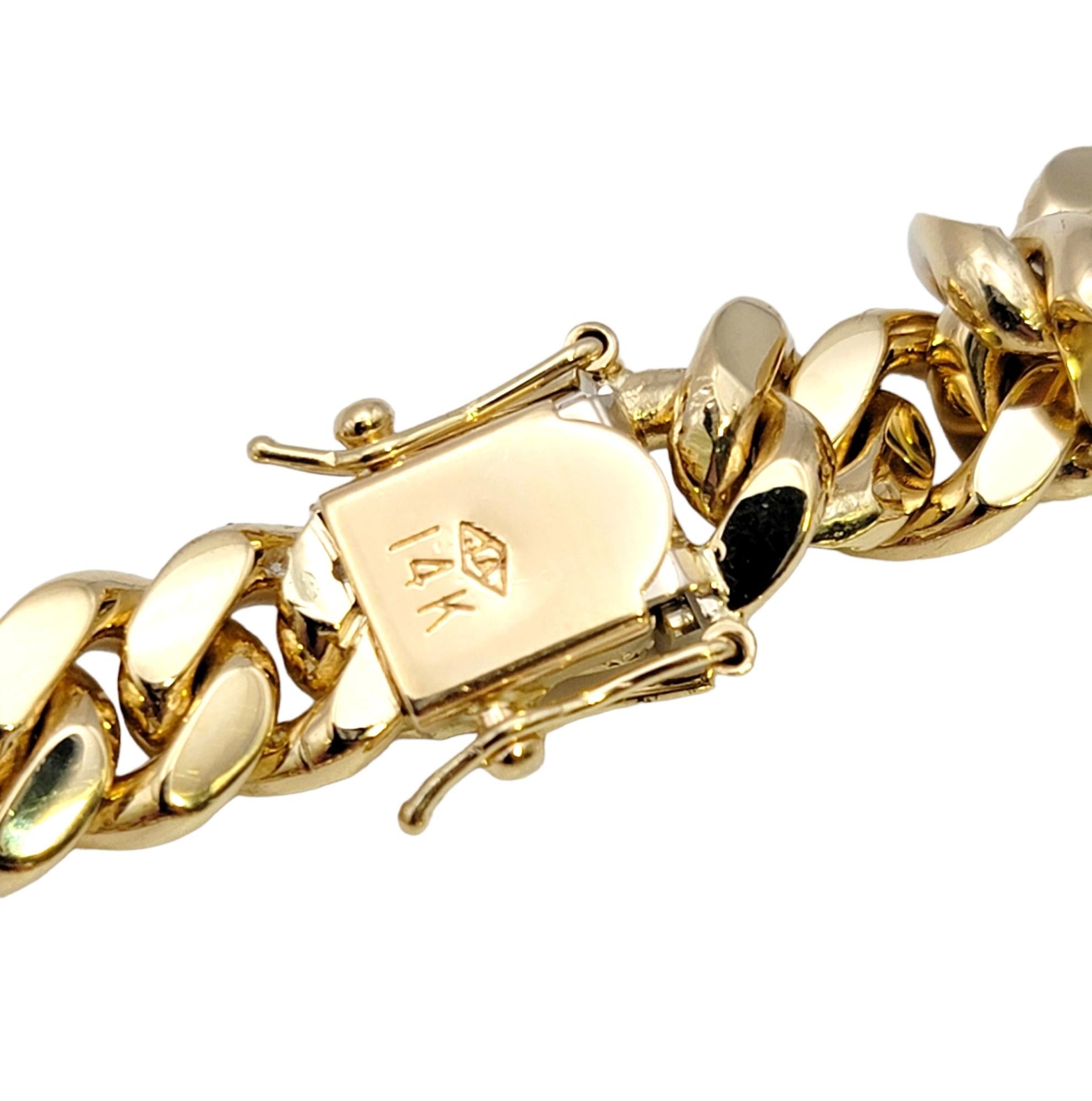 Unisex 14 Karat Yellow Gold Curb Link Bracelet with Pave Diamond Accents For Sale 3