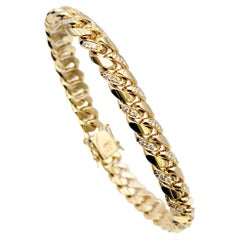 Unisex 14 Karat Yellow Gold Curb Link Bracelet with Pave Diamond Accents