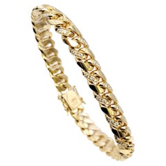 Einzigartiges Gliederarmband aus 14 Karat Gelbgold mit Diamant-Akzenten in Pavé-Optik