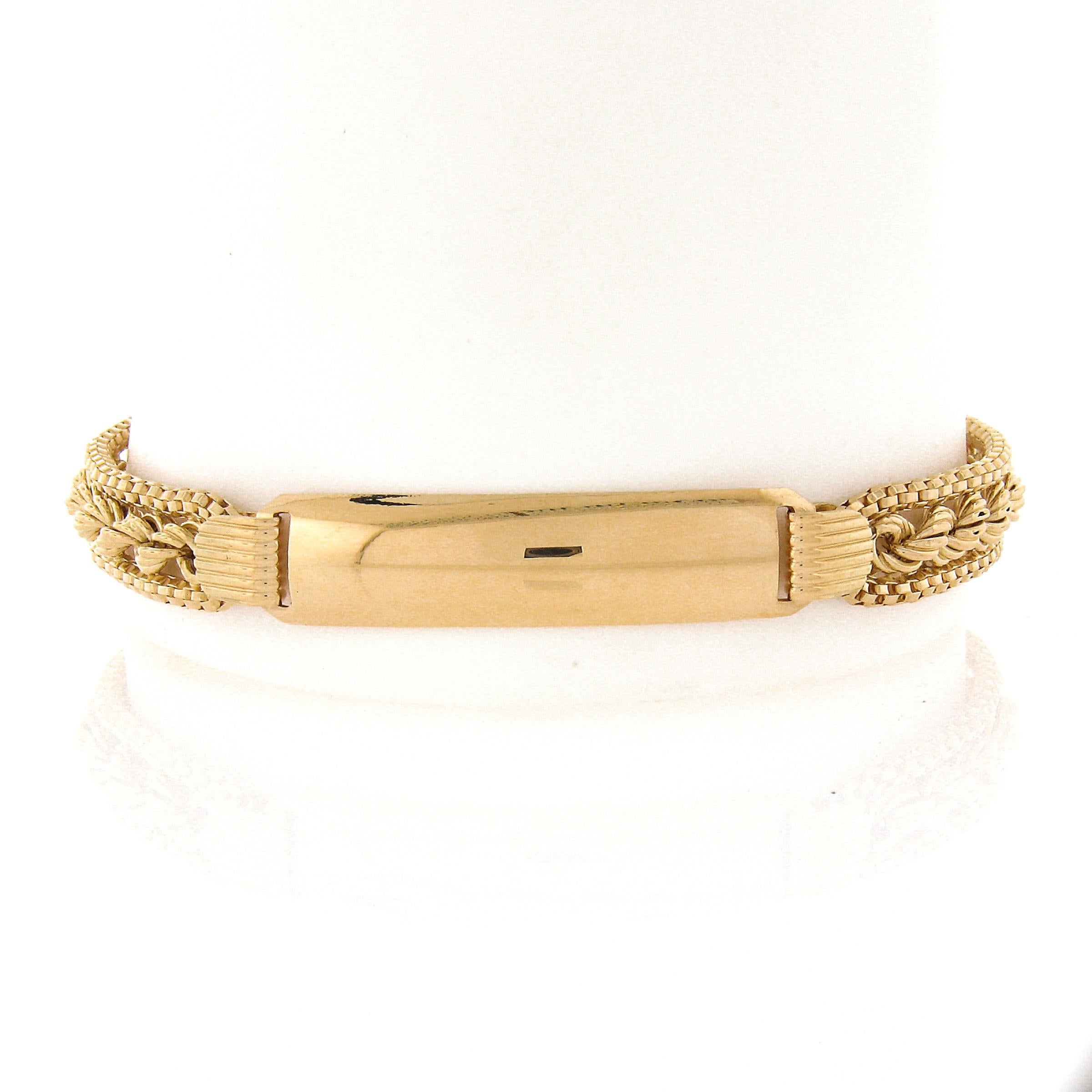 Material: Solid 18k Yellow Gold
Weight: 14.78 Grams
Length: Will comfortably fit up to a 7.5 inch wrist (fitted on a wrist) 
Chain Type: 4.1mm Rope Link
Clasp: Spring Ring
Centerpiece Dimensions: 37.6x8.7mm - Engrave-able (Please contact us prior to