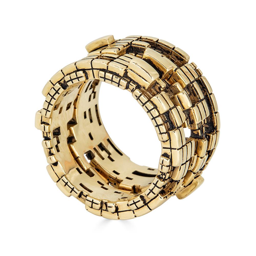 This unisex, 18K Gold Bitcoin Blockchain Ring is meant to represent interconnectedness in an ever-changing world. This 18k yellow gold ring was inspired by the Bitcoin Blockchain. This ring can unlock into two parts to share one half with a friend.