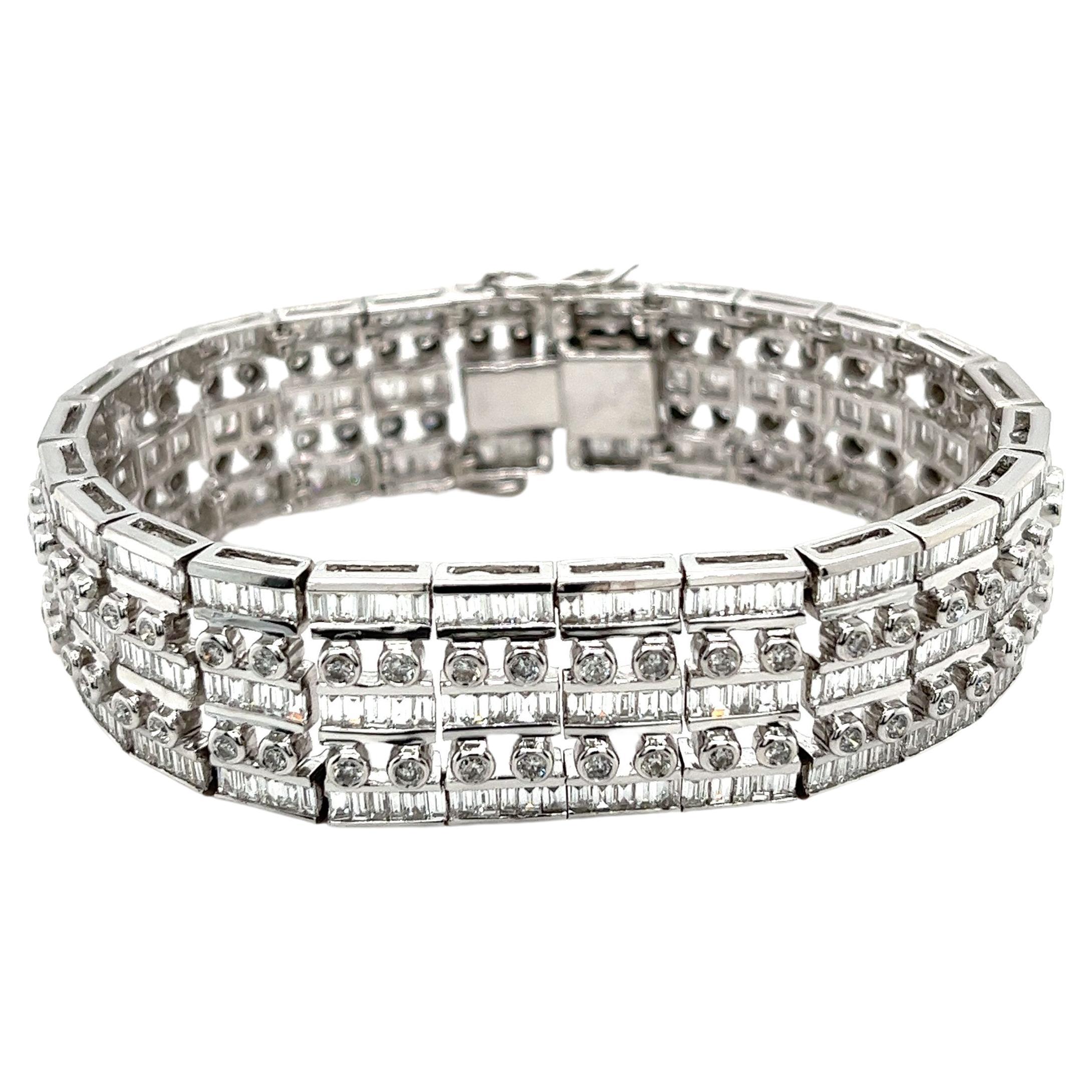 Experience the pinnacle of luxury with our 17.2 carat natural diamond link bracelet. Crafted from 18k white gold, it features 375 baguette and 100 round cut diamonds arranged in a five-row design. Unisex and weighing 68 grams with a width of 17.6mm,