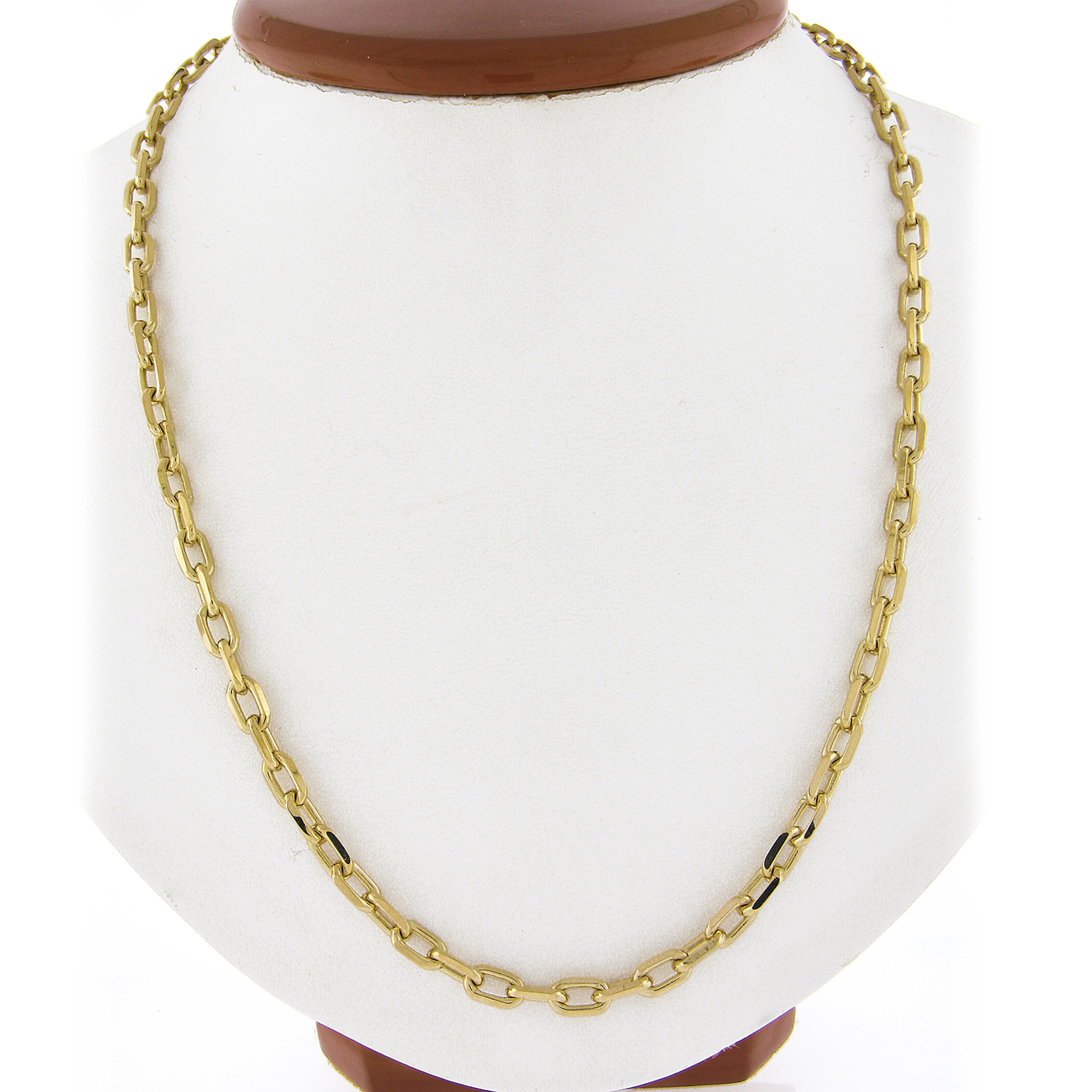 Here we have a beautiful chain necklace that was crafted from solid 18k yellow gold. This chain features well made fancy faceted open cable link with a nice high-polished finish throughout, measuring 18.75 inches in length, and is secured with a