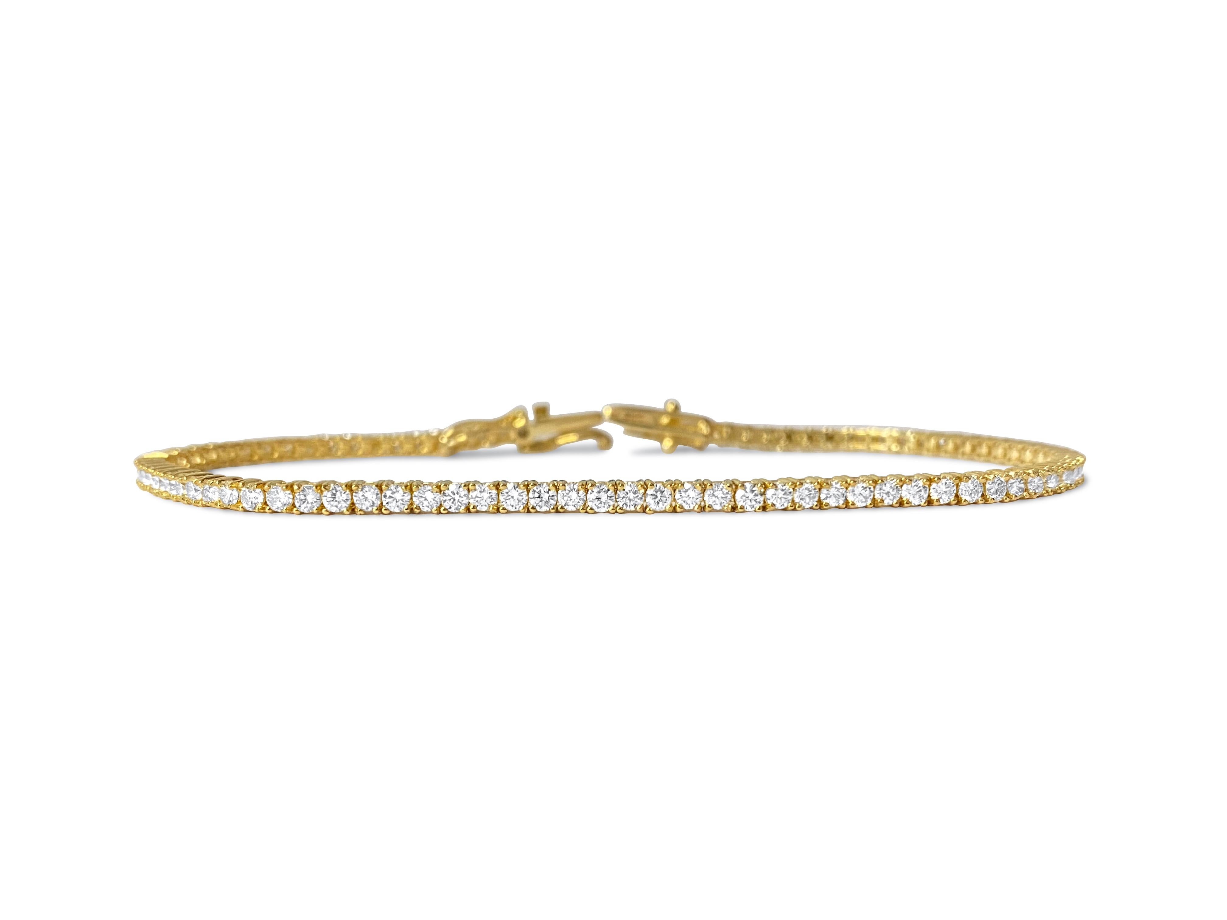Material: The bracelet is made of 14-karat yellow gold. It has diamonds that weigh 3.08 carats in total. The diamonds are really clear (VVS-VS clarity) and have a color grade of H. They are all natural, mined from the earth. The diamonds are cut in