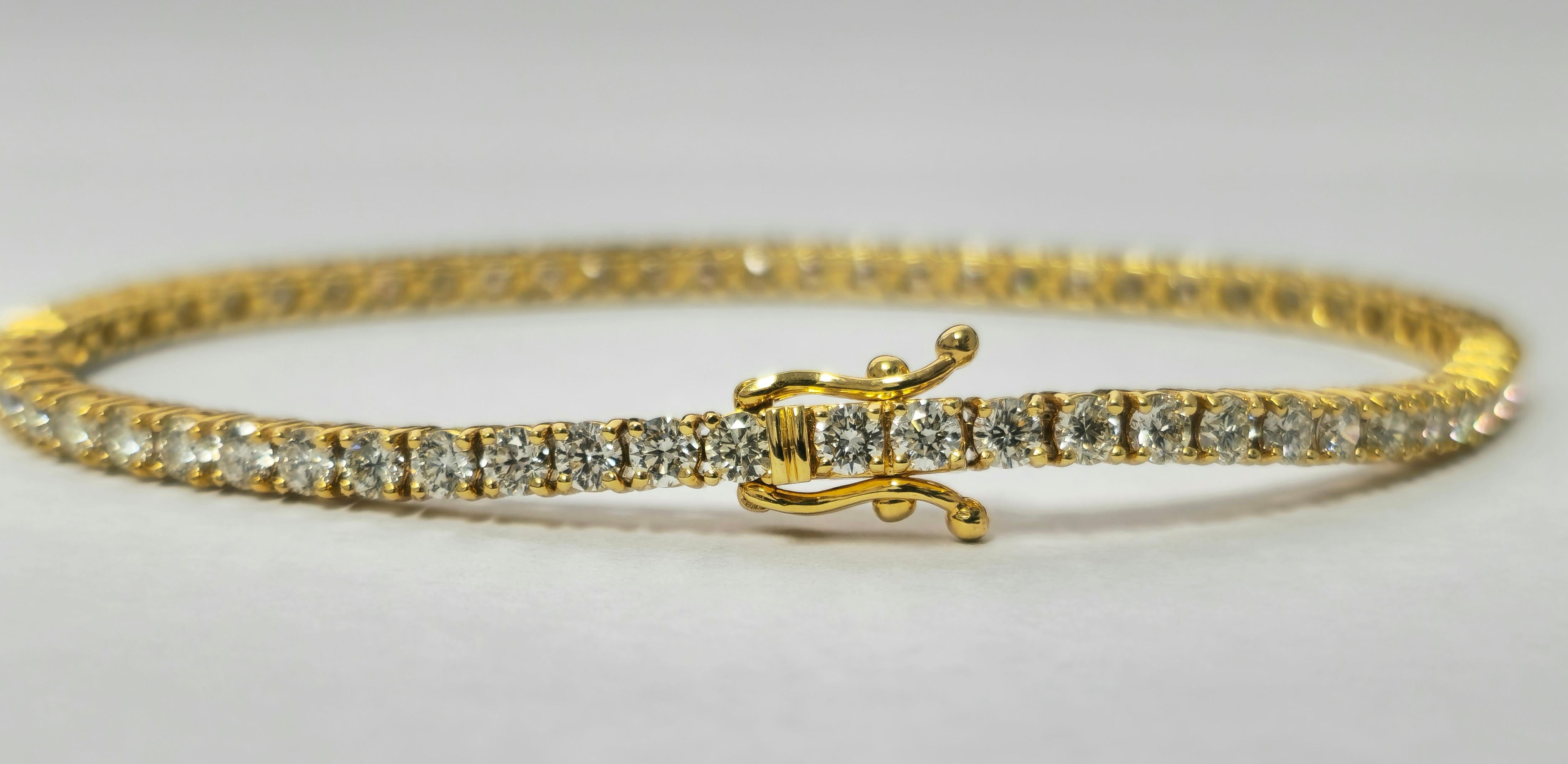 Unisex 14k Gelbgold-Tennisarmband mit 6,00 Karat Diamanten im Angebot 1
