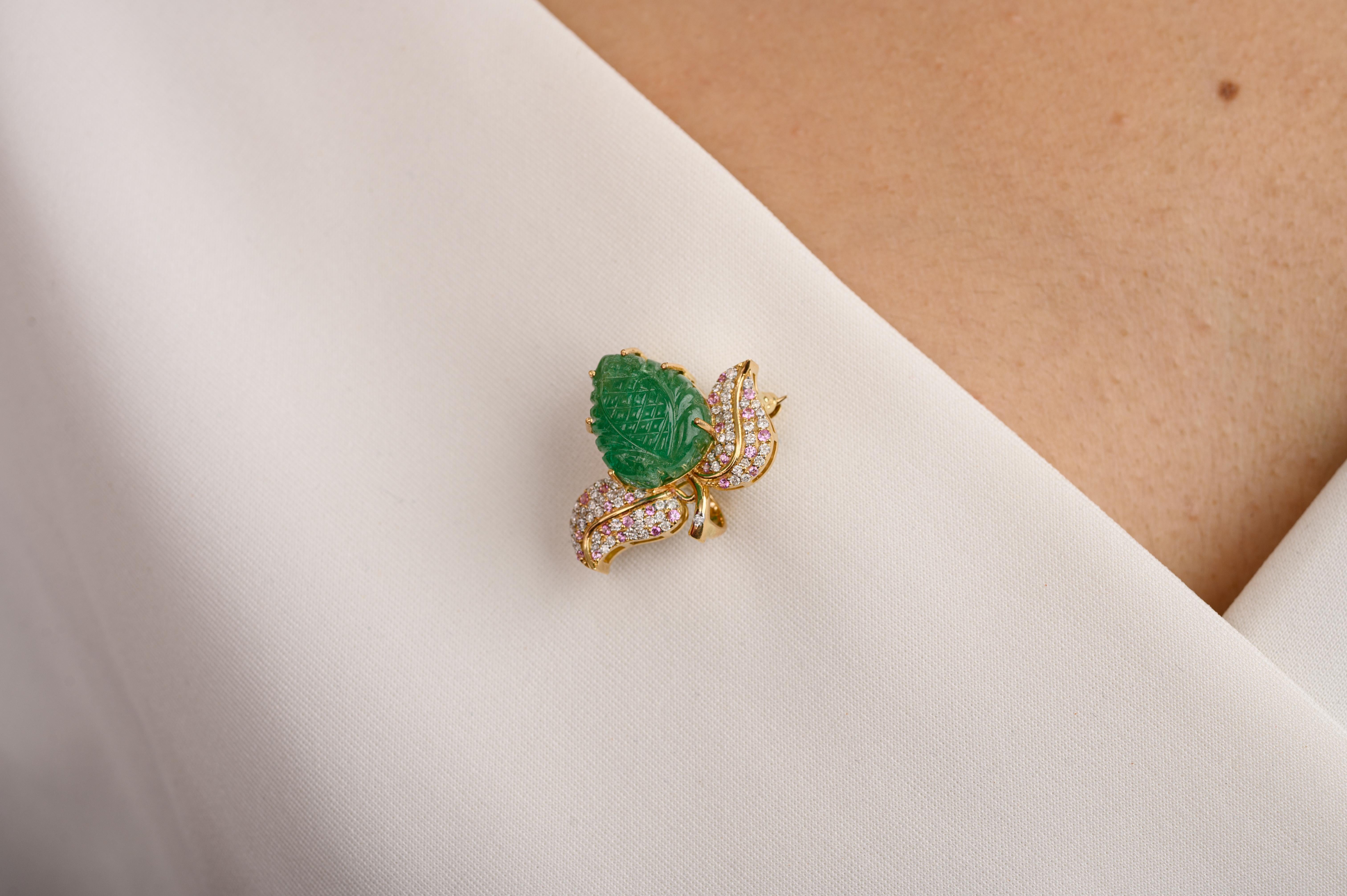 Unisex 8.88 Carat Carved Emerald Diamond Leaf Brooch Pin Gift Made in 18K Gold which is a fusion of surrealism and pop-art, designed to make a bold statement. Crafted with love and attention to detail, this features 8.88 carats of emerald which