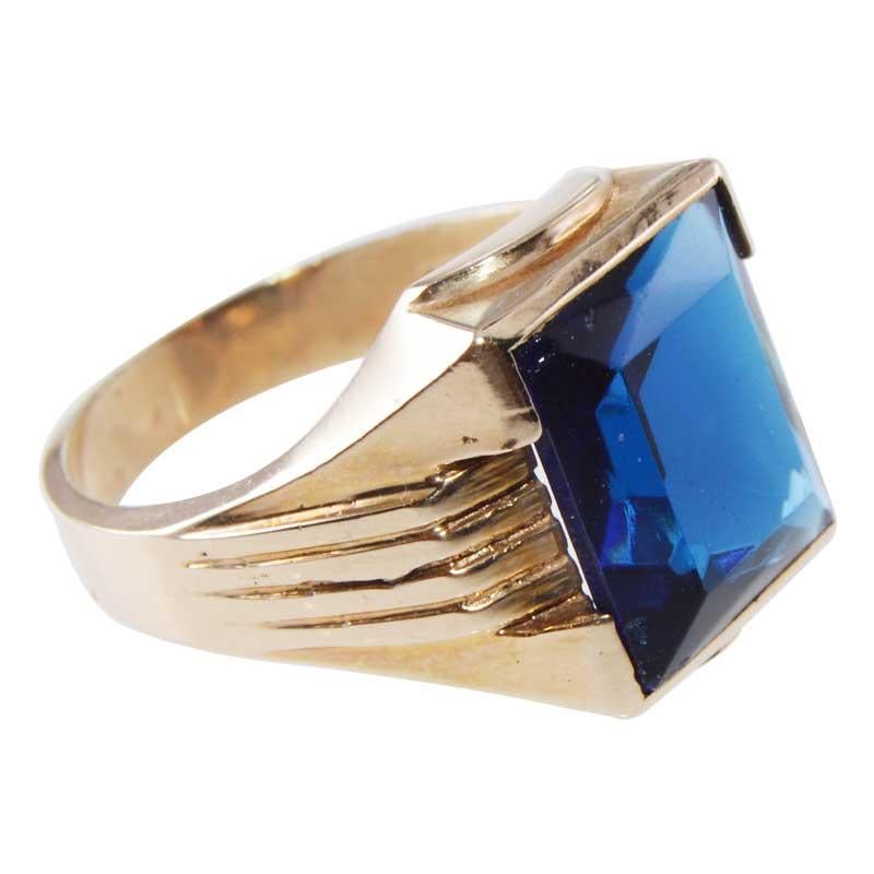 UNISEX RING
STYLE / REFERENCE: Art Deco
METAL / MATERIAL: 10kt. Solid Gold
CIRCA / YEAR: 1940's
Stone: Synthetic Sapphire
SIZE: 8.5 

This great looking ring can be worn by a man or a woman and is easy to size. The ring is entirely hand made and the