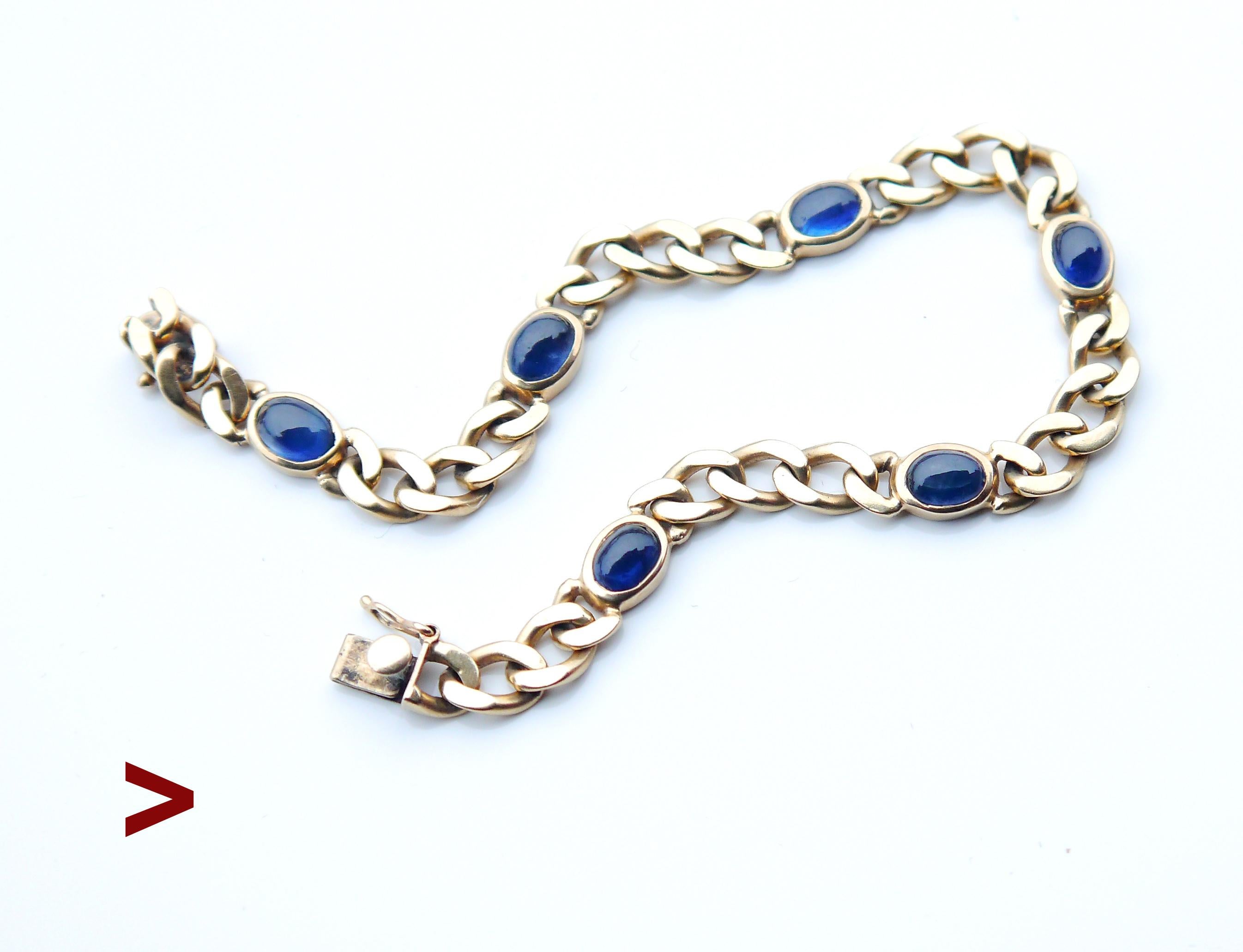 Bracelet from 1950 - 1960s for Men and Women in solid 14K Yellow Gold decorated with six natural Blue Sapphire stones cur cabochons.Hallmarked / tested solid 14K Yellow Gold metal.

Each stone measuring ca. 6 mm x 4 mm x 3.5 mm / ca. 0.75ct each /