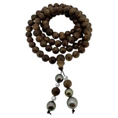 Collier unisexe d'inspiration bouddhiste Perles en bois de santal et perles de Tahiti