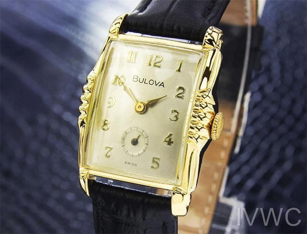 A timeless elegant classic, Men's midsize/unisex Bulove L4 gold-plated dress watch, c.1940s. Verified authentic by a master watchmaker. Gorgeous Bulova signed gold dial, applied Arabic numeral hour markers, gilt minute and hour hands, sweeping