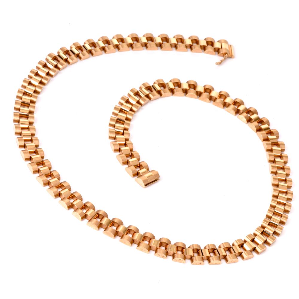This immaculately rendered heavy 18 karat yellow gold necklace depicts the elegant fancy tank chain links, weighs 73 grams and measures 20 inches long x 10mm wide. Timelessly elegant, appropriate for all outfits and pleasantly flexible in style,