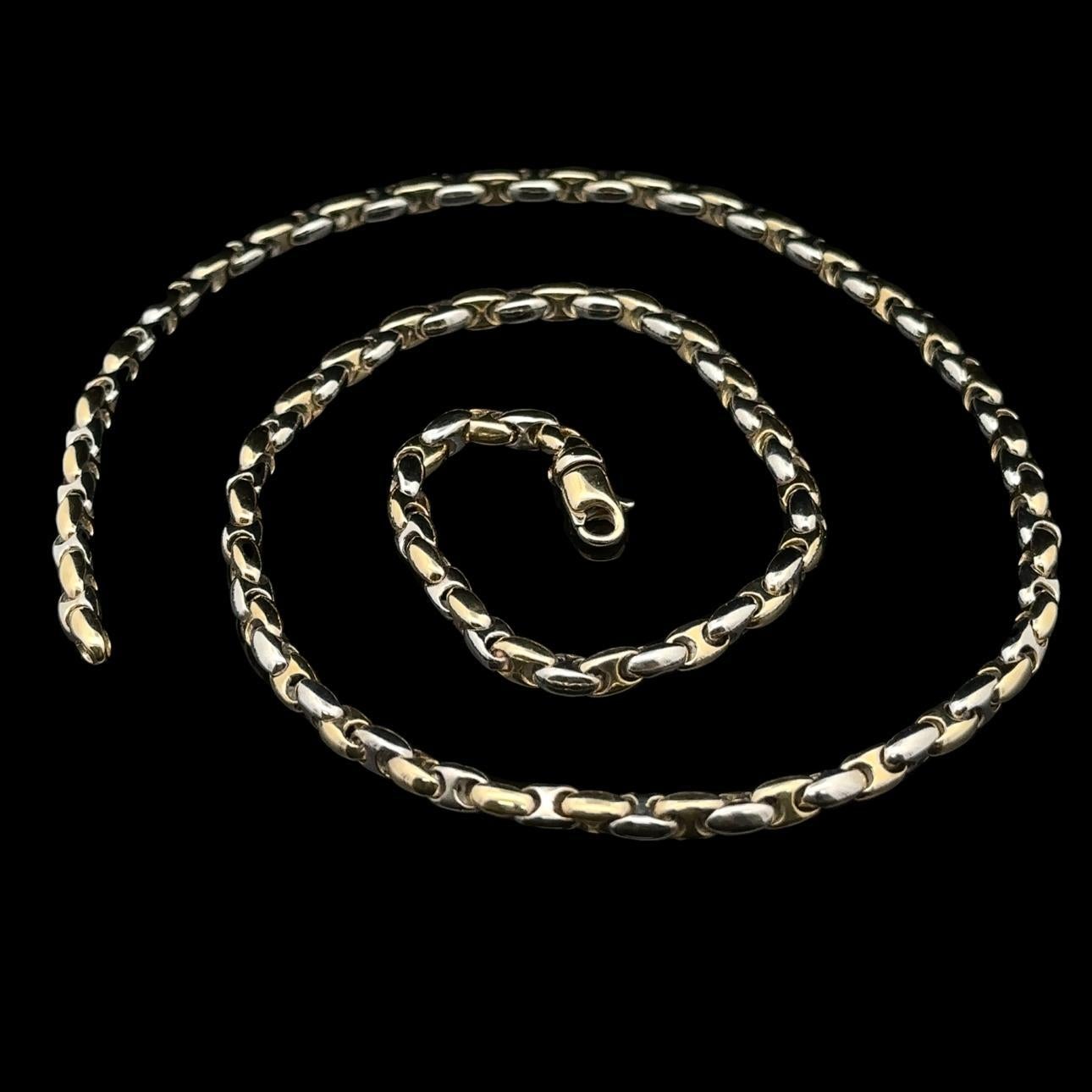 Material: Solid 14k Yellow & White Gold
Weight: 38.9 Grams
Chain Type: Linked Beads Chain
Chain Length: 20 inches
Chain Width: 4.5mm (approx.)
Clasp: Lobster Claw
End Loop Thickness & Width: 4.4mm & 3mm (approx.)
Stamp: 14kt Italy
Condition: