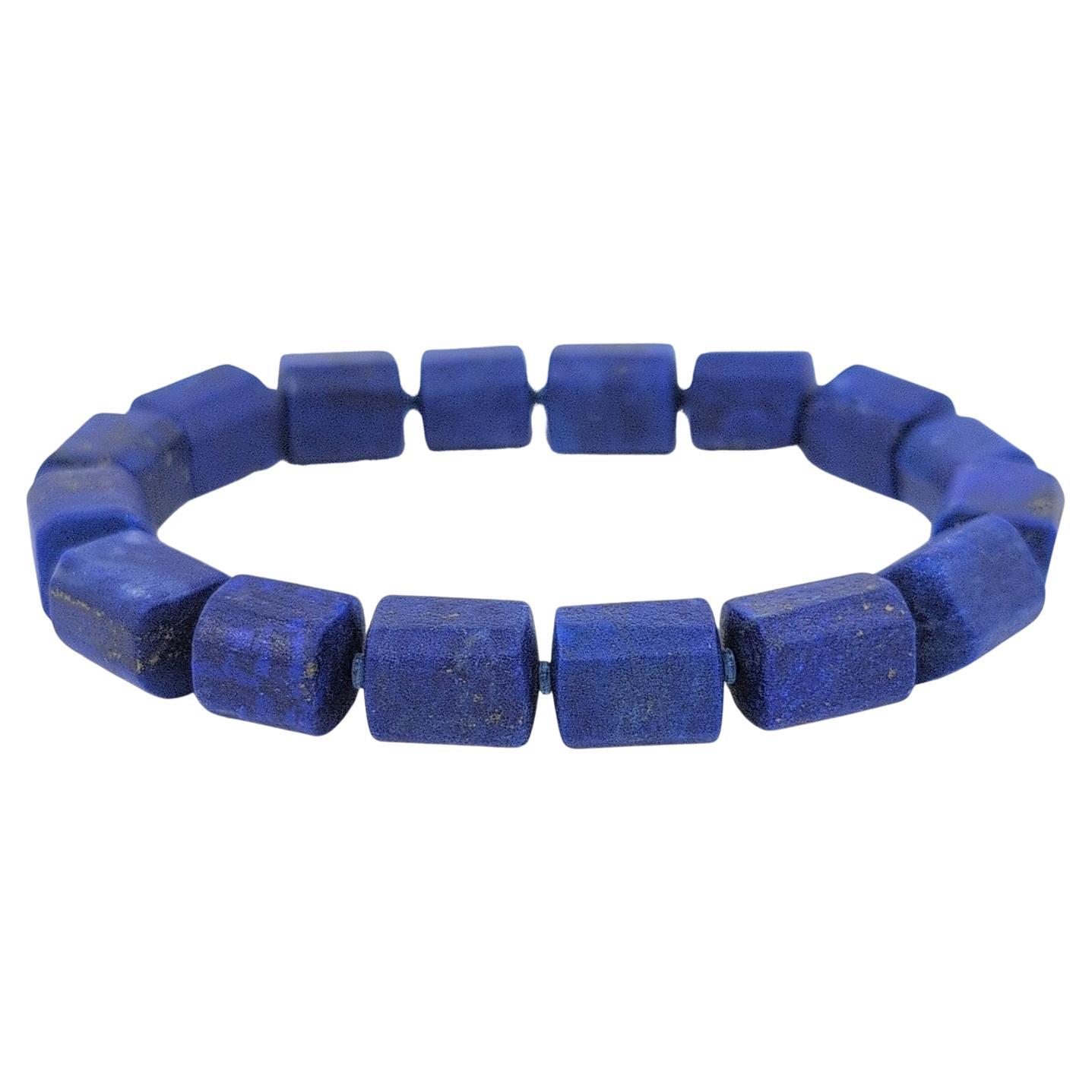 Unisex Lapis Lazuli Bracelet with Carved Rectangular Barrel Beads 7" wrist For Sale