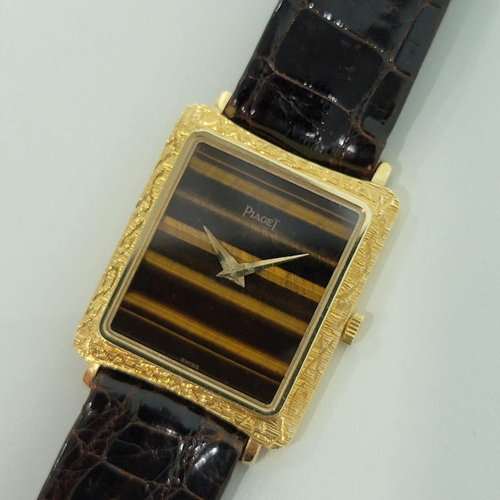 Klassische Luxus, Unisex 18k massivem Gold Piaget Protocole schlanke Kleid Uhr, c.1970s, in ausgezeichnetem Zustand. Von einem Uhrmachermeister für echt befunden. Wunderschönes, von Piaget signiertes Tigerauge-Zifferblatt, keine Stundenmarkierungen,