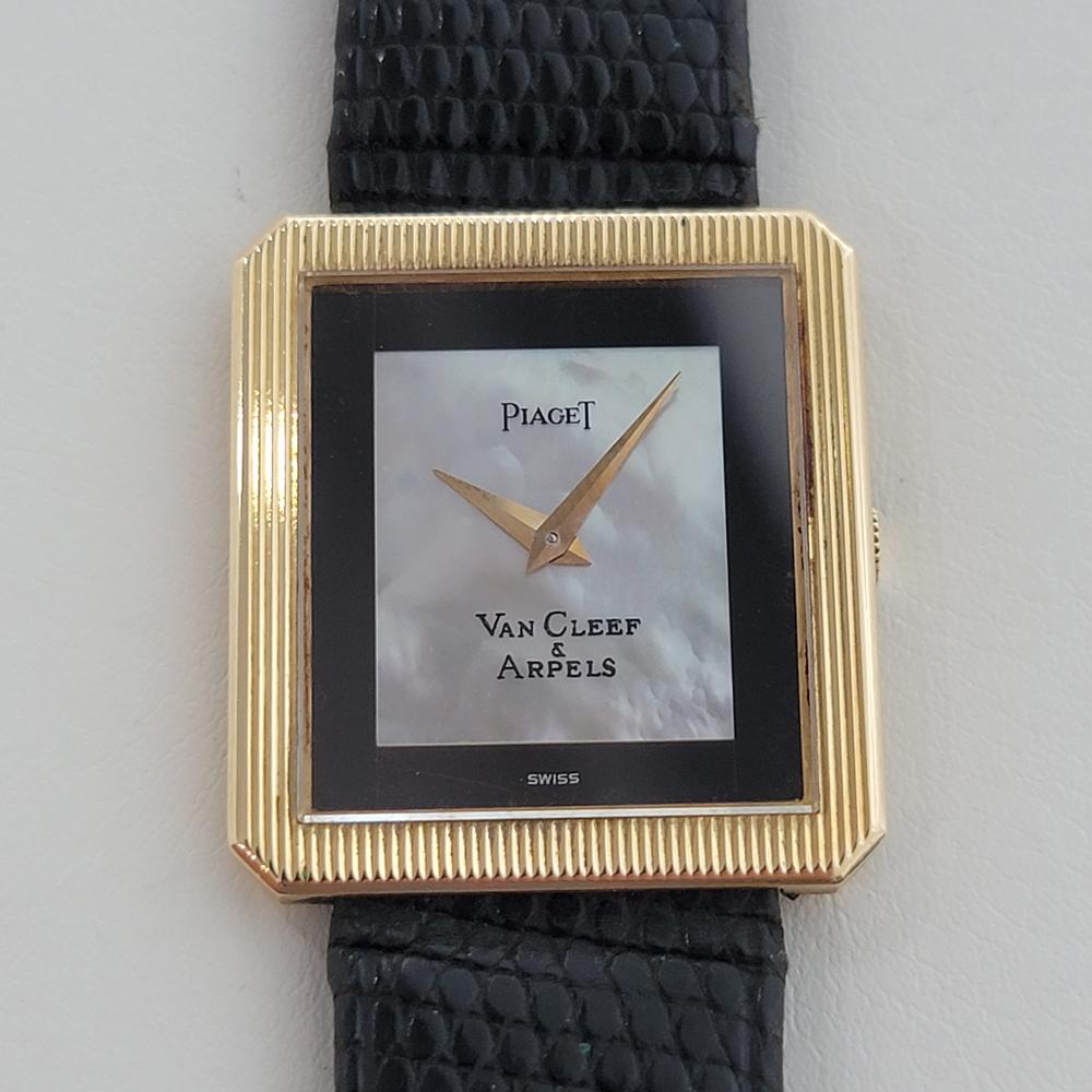 Classic luxury, Unisex 18k solid gold Piaget Protocole slim dress watch detailed by Van Cleef & Arpels, c.1970s, in excellent working condition. Verified authentic by a master watchmaker. Gorgeous MOP dial with black border signed by Piaget and Van