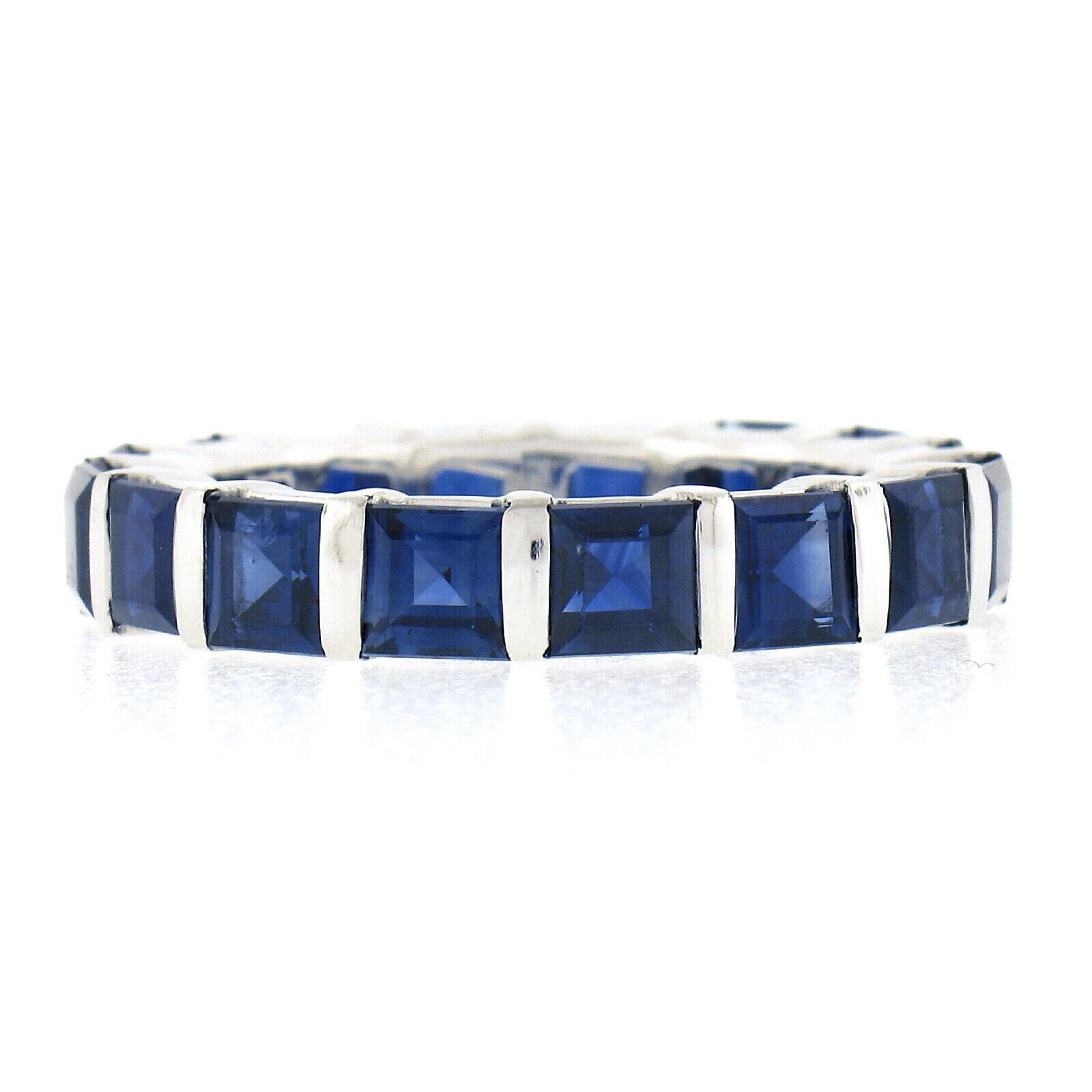 Unisex Platinum 5.61ctw Square Step Cut Sapphire Bar Channel Eternity Band Ring In Excellent Condition For Sale In Montclair, NJ
