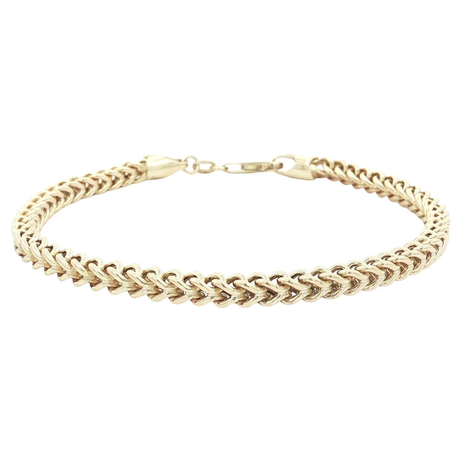 Bracelet unisexe en or jaune 10k et chaîne à maillons Franco 7.5". en vente