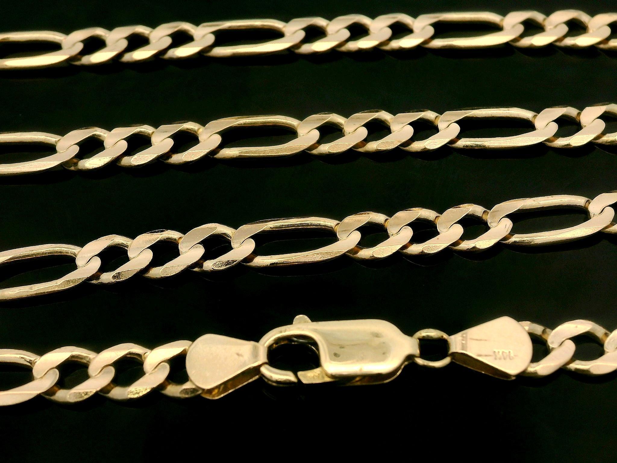 MATERIAL : Or jaune 14k massif 
Poids : 20,9 grammes
Type de chaîne : 21.5