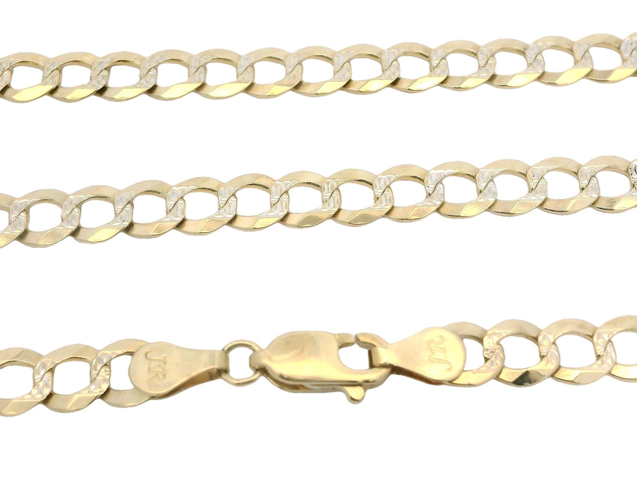 MATERIAL : Or jaune 14 carats massif avec accents d'or blanc
Poids : 19,25 grammes
Type de chaîne : Maillon cubain
Longueur de la chaîne : 24 pouces
Largeur de la chaîne : 5.7 mm (environ)
Fermoir : Griffe de homard
Épaisseur : 1 mm
Épaisseur et
