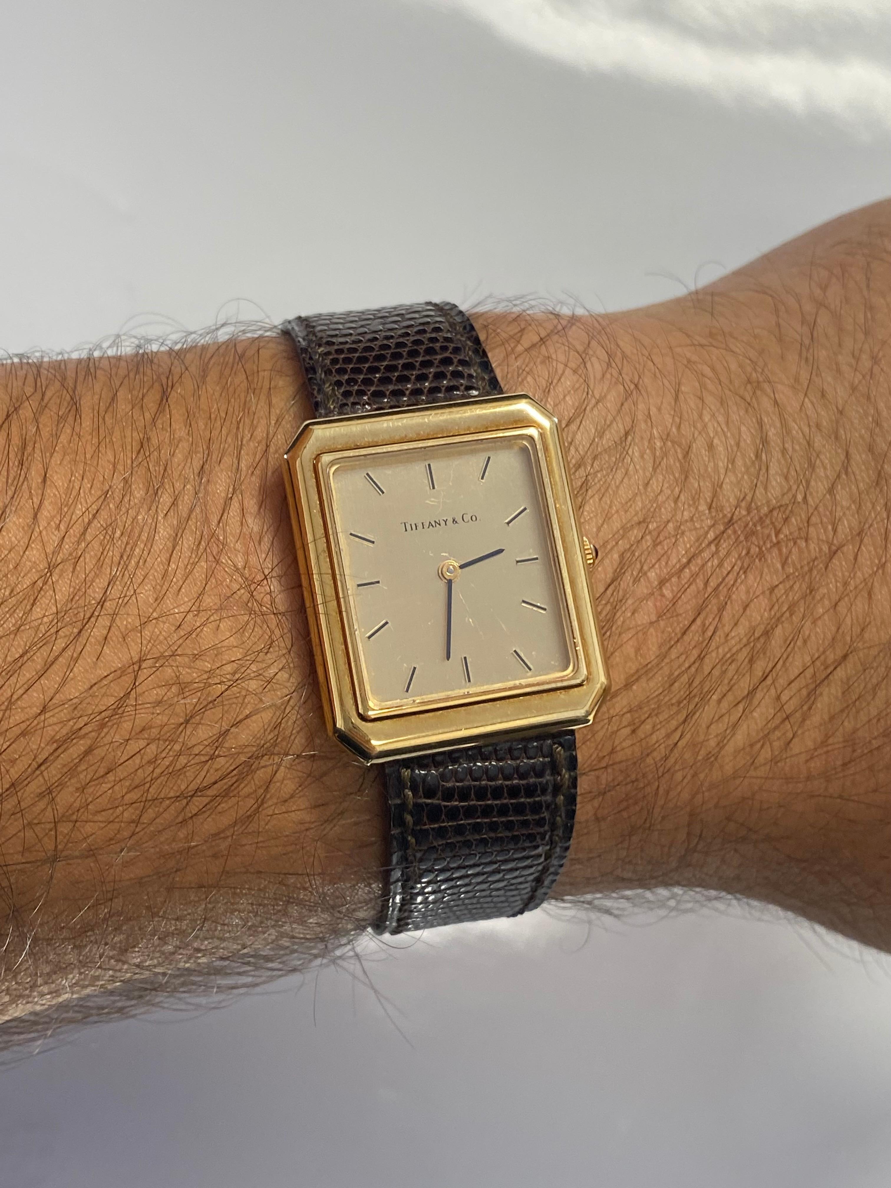 18k gold watch with leather band