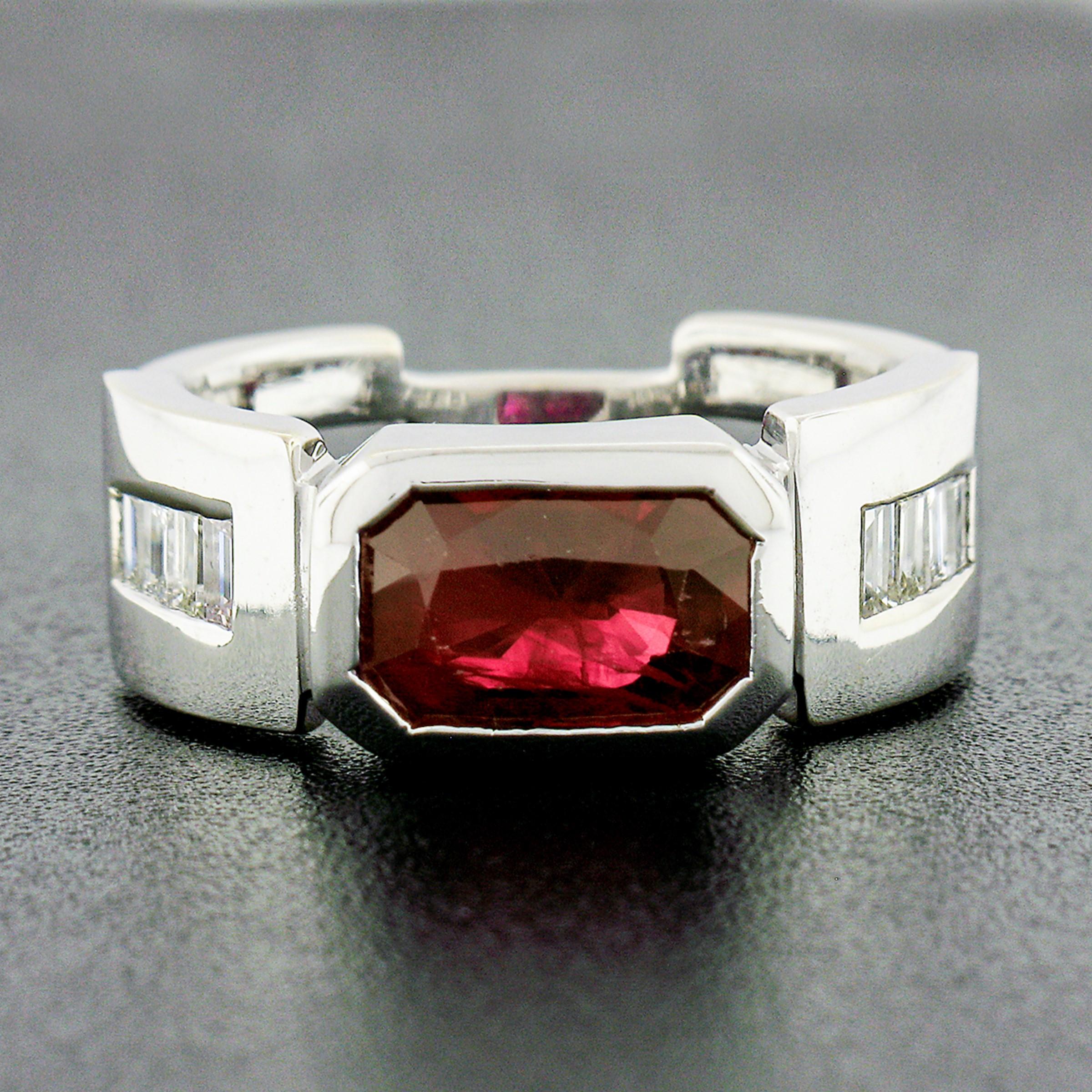 You're looking at an outstanding vintage ring that was crafted from solid 14k white gold. It features an elongated octagonal step cut, GIA certified, natural ruby neatly bezel set at the center. The ruby has a gorgeous deep red color that brings a