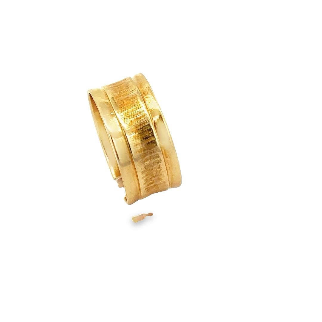 Material: Solid 18k Yellow Gold
Weight: 4.89 Grams
Ring Size: 9 (measured on finger - We cannot size this ring)
Ring Width: 9.5mm
Ring Height: 1mm rise off the finger
Condition: Vintage, original finish & patina intact. Shows surface wear. 
Stock