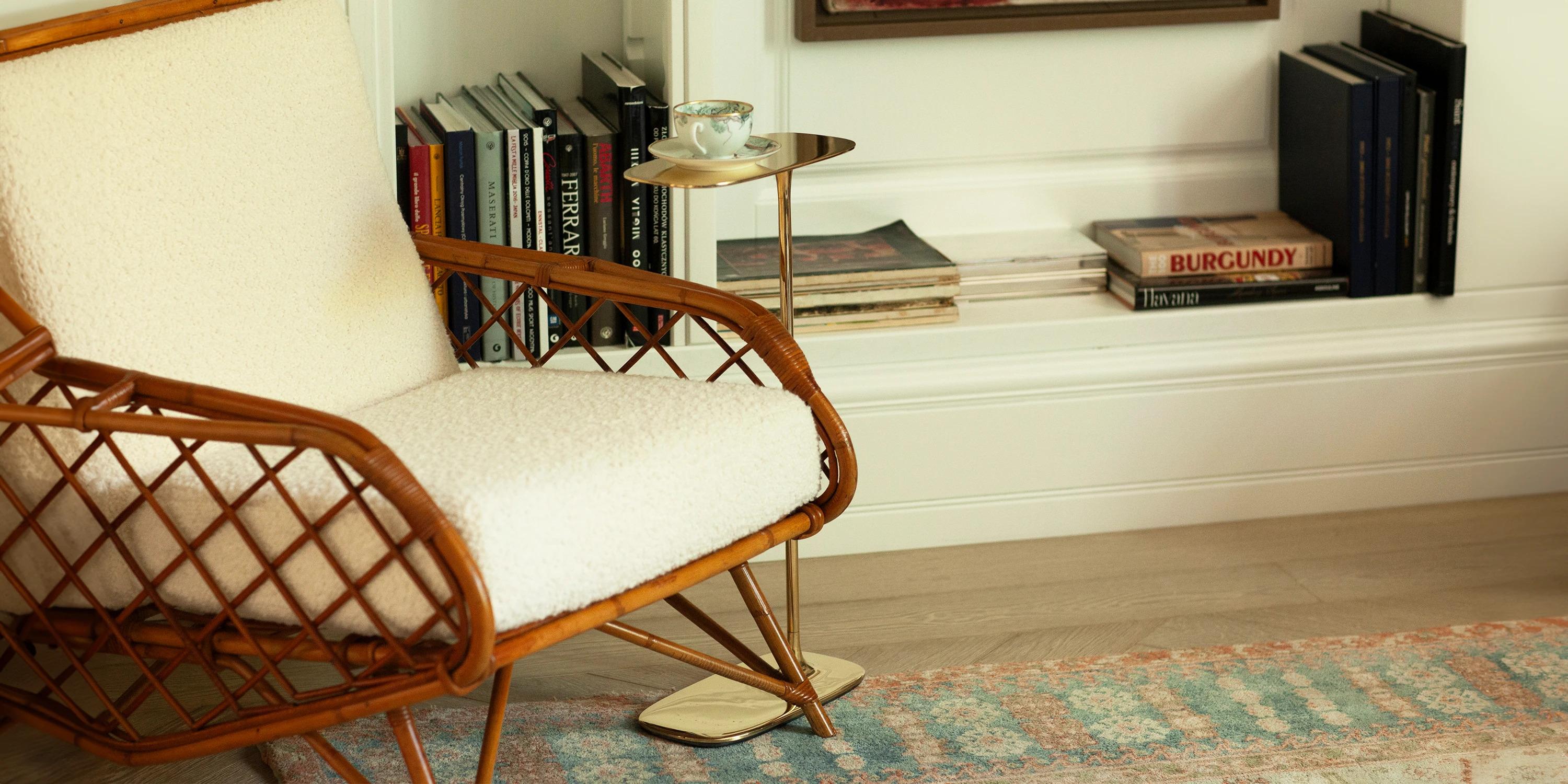A set of two side tables that will perfectly complement the interior of your living room.

The Fluid Side Table, crafted using the sand-casting method and standing 64 cm tall, is designed to slide effortlessly under any sofa or armchair. The table